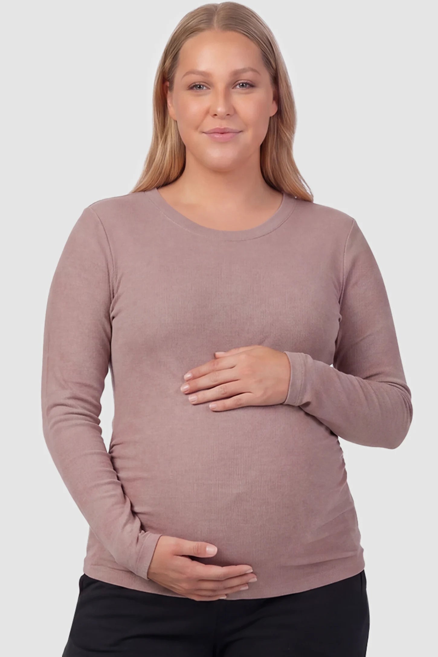 Basic Long Sleeve Maternity Top Basic Long Sleeve Maternity Top in light brown featuring a soft crew neck and lightweight stretch fabric on a plus size pregnant model, front view