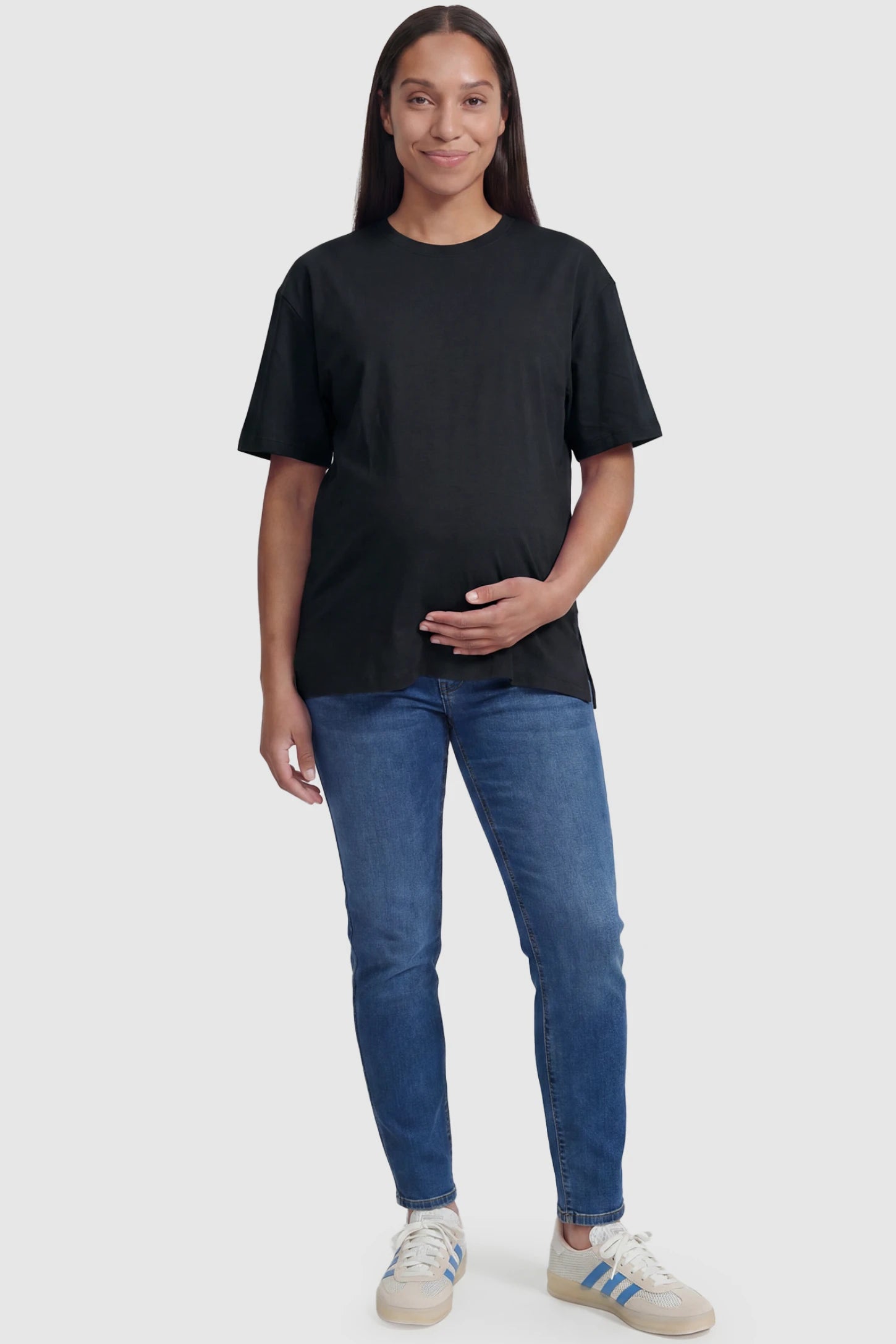 Basic One-Sided Slit Short Sleeve Maternity Top Basic one-sided slit short sleeve maternity top in black with classic round neckline, front view on pregnant model