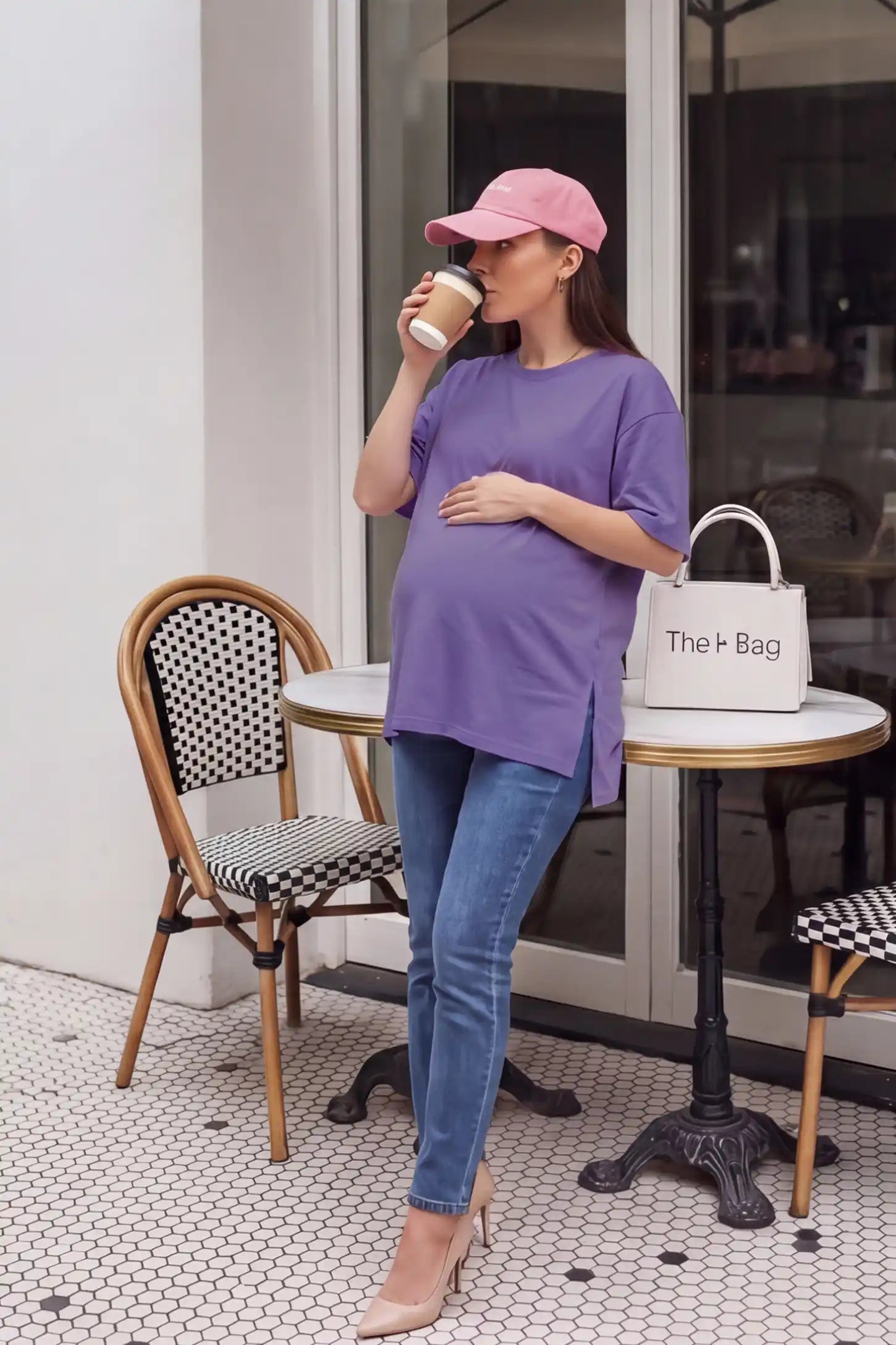 Basic One-Sided Slit Short Sleeve Maternity Top Basic one-sided slit short sleeve maternity top in purple with classic round neckline, side view on pregnant model