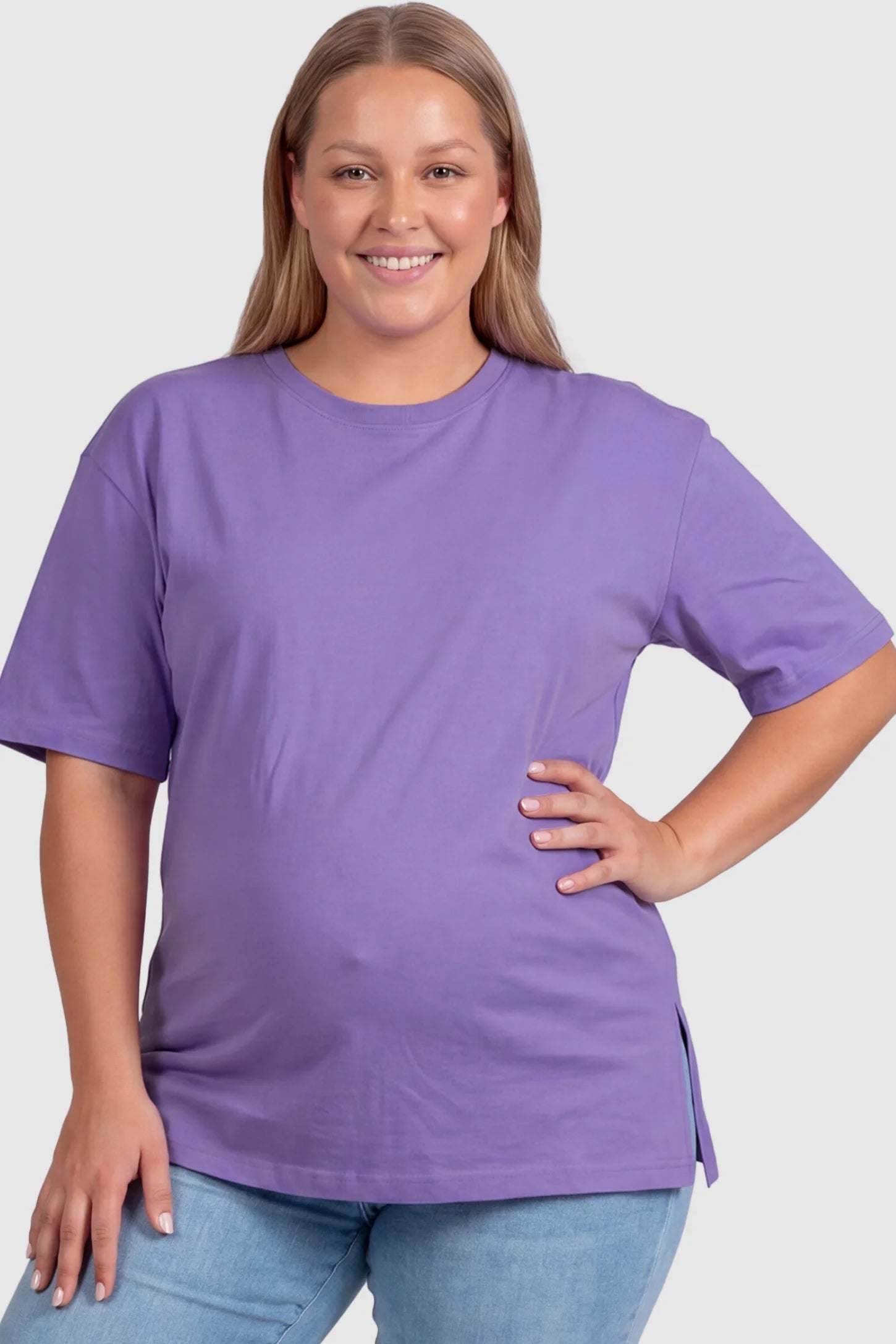 Basic One-Sided Slit Short Sleeve Maternity Top Basic one-sided slit short sleeve maternity top in purple with classic round neckline, front view on plus-size model