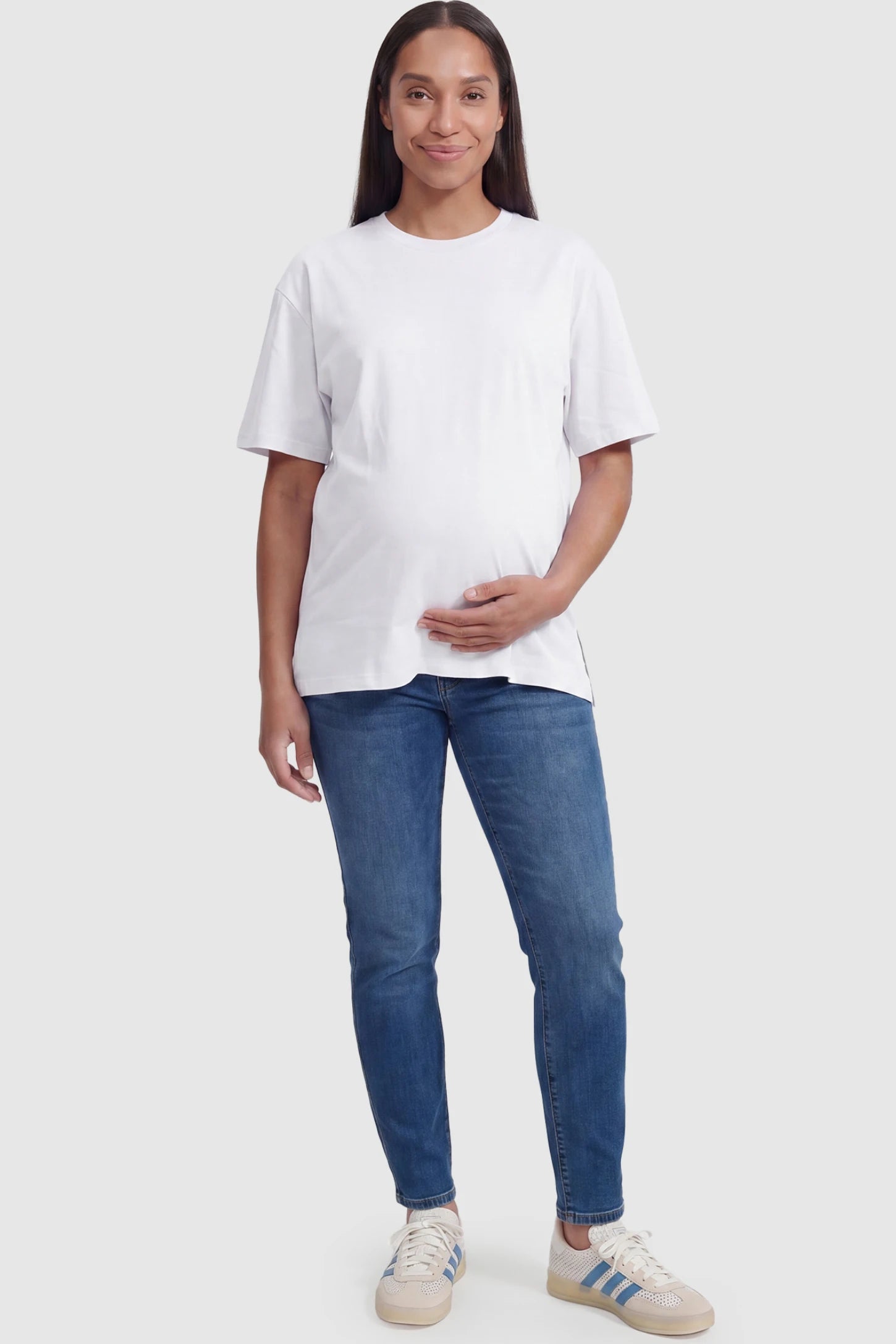 Basic One-Sided Slit Short Sleeve Maternity Top Basic one-sided slit short sleeve maternity top in white with classic round neckline, front view on pregnant model
