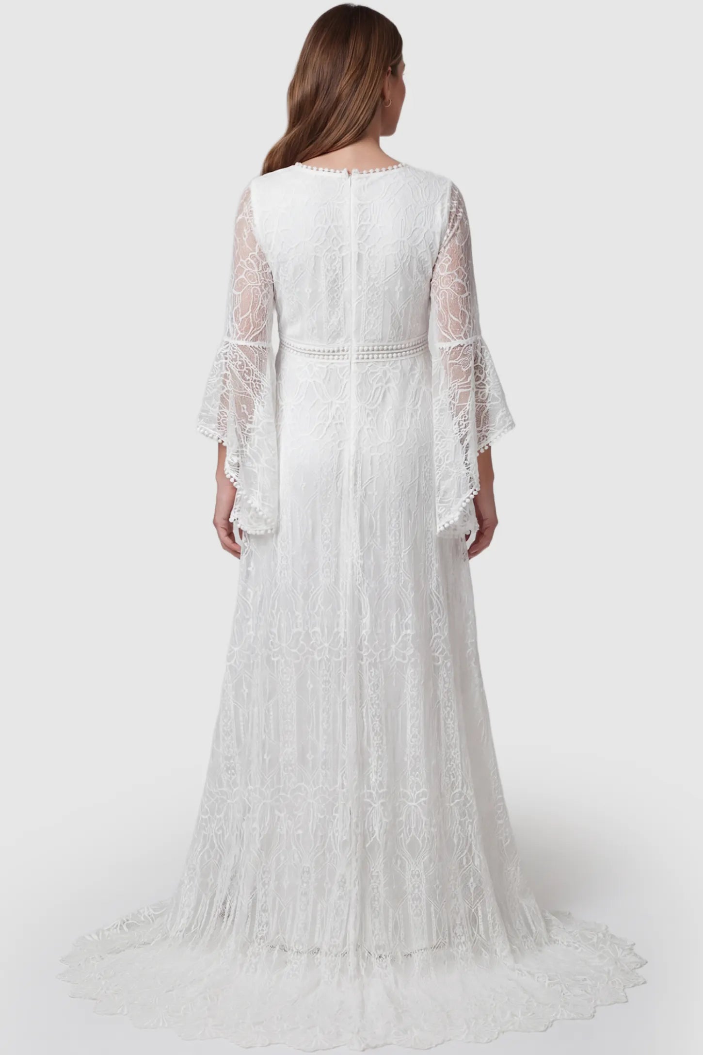 Lace Bell-Sleeve Maternity Dress Lace Bell Sleeve Bridal Maternity Gown in white featuring scalloped lace hem and flowy back train on a pregnant model back view