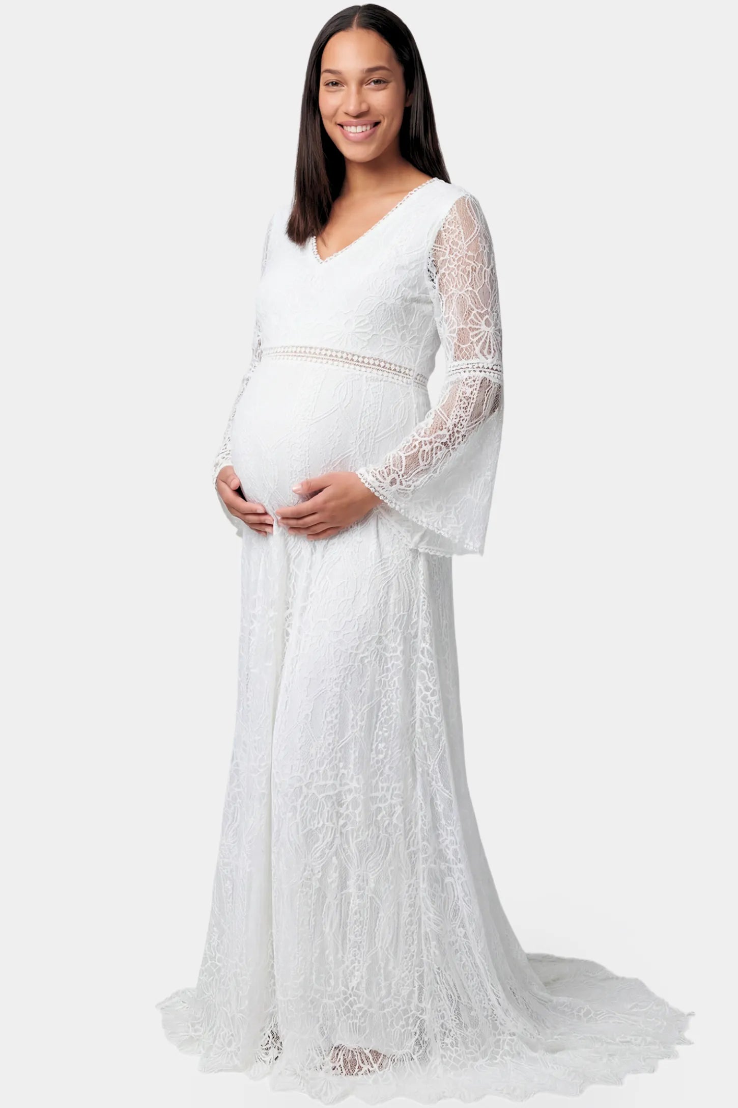 Lace Bell Sleeve Bridal Maternity Gown in white featuring scalloped lace hem and flowy back train on a pregnant model.