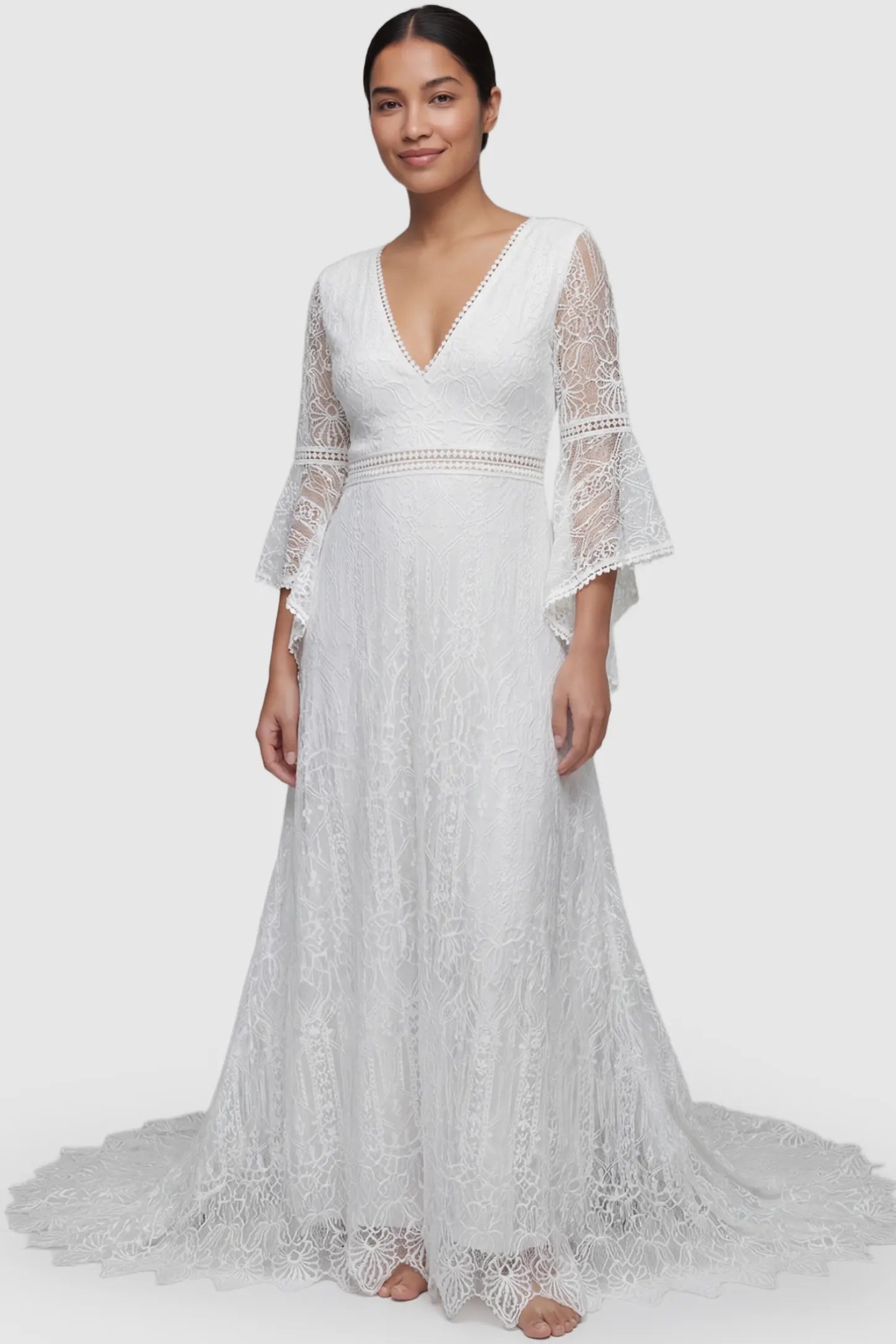 Lace Bell-Sleeve Maternity Dress Lace Bell Sleeve Bridal Maternity Gown in white featuring scalloped lace hem and flowy back train on a postpartum model front view