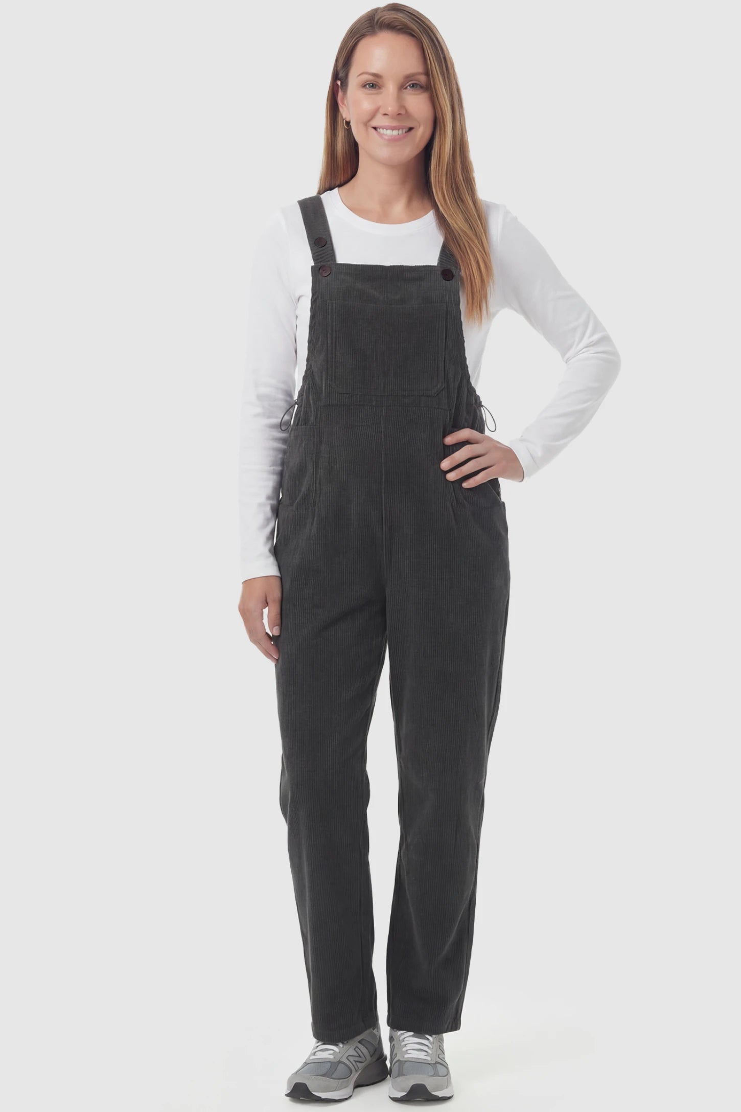Corduroy Adjustable-Strap Maternity Overalls Corduroy adjustable-strap maternity overalls in gray with retro corduroy texture, front view on postpartum model