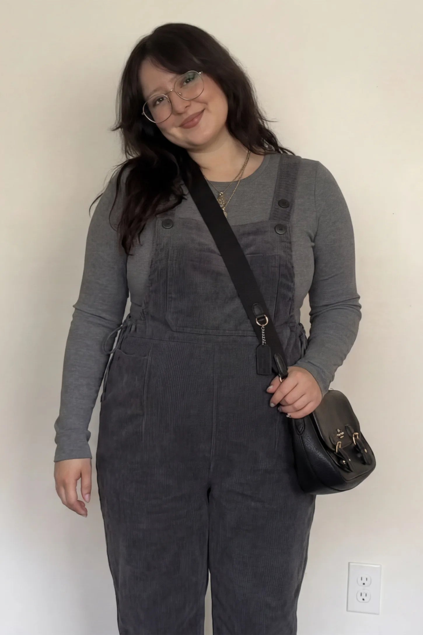 Corduroy Adjustable-Strap Maternity Overalls Corduroy adjustable-strap maternity overalls in gray with retro corduroy texture, front view on pregnant model