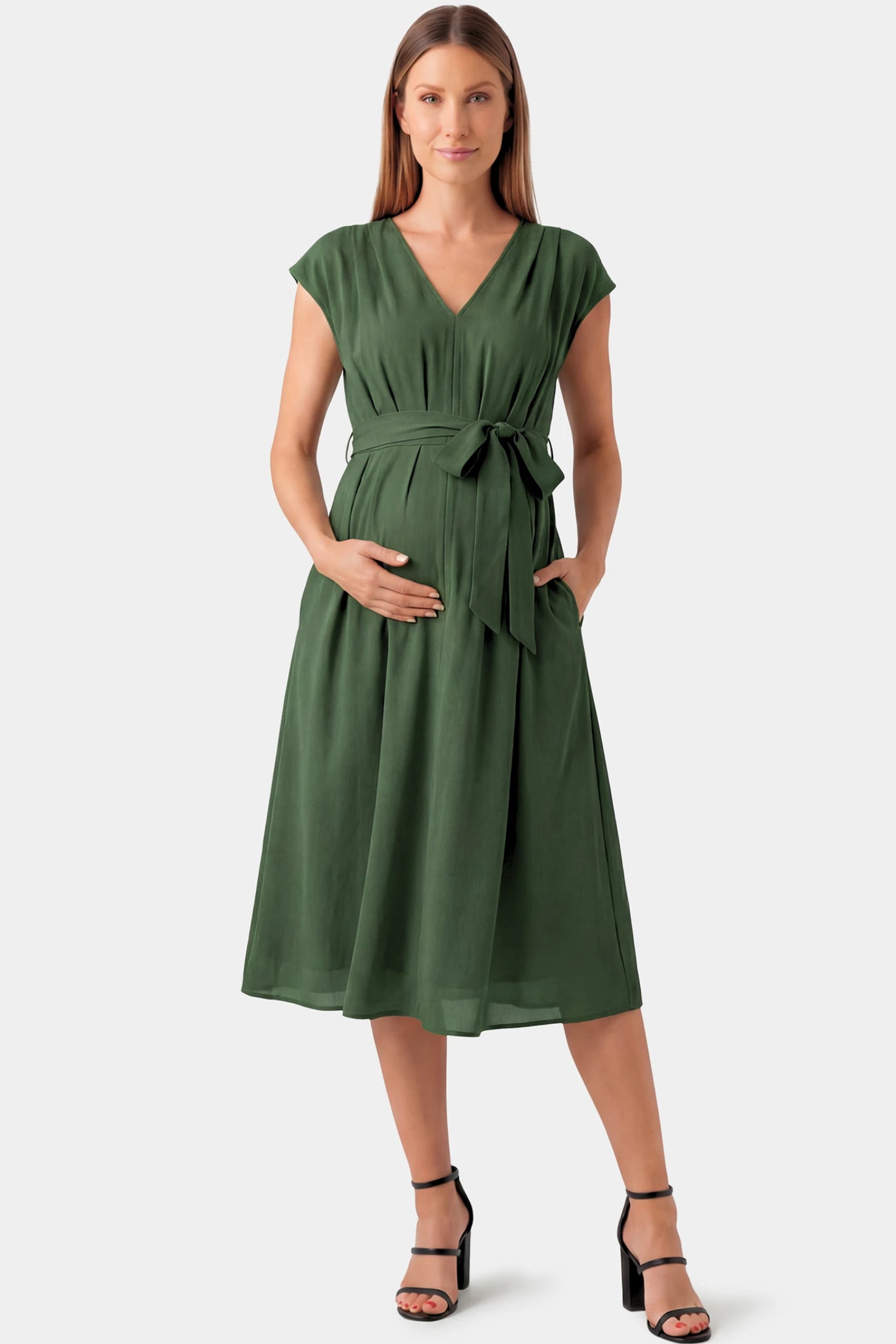 Cap Sleeves Belted Maternity Midi Dress Cap Sleeves Belted Maternity Midi Dress in army green featuring a V-neckline, cap sleeves, and a self-tie waist belt on a pregnant model.