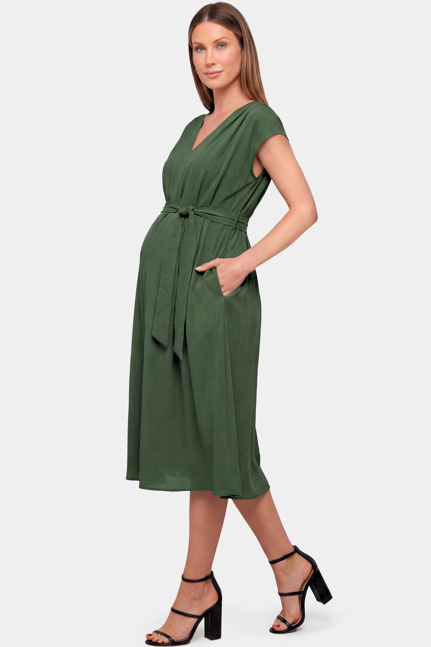 Cap Sleeves Belted Maternity Midi Dress Cap Sleeves Belted Maternity Midi Dress in army green featuring a V-neckline, cap sleeves, and a self-tie waist belt on a pregnant model.