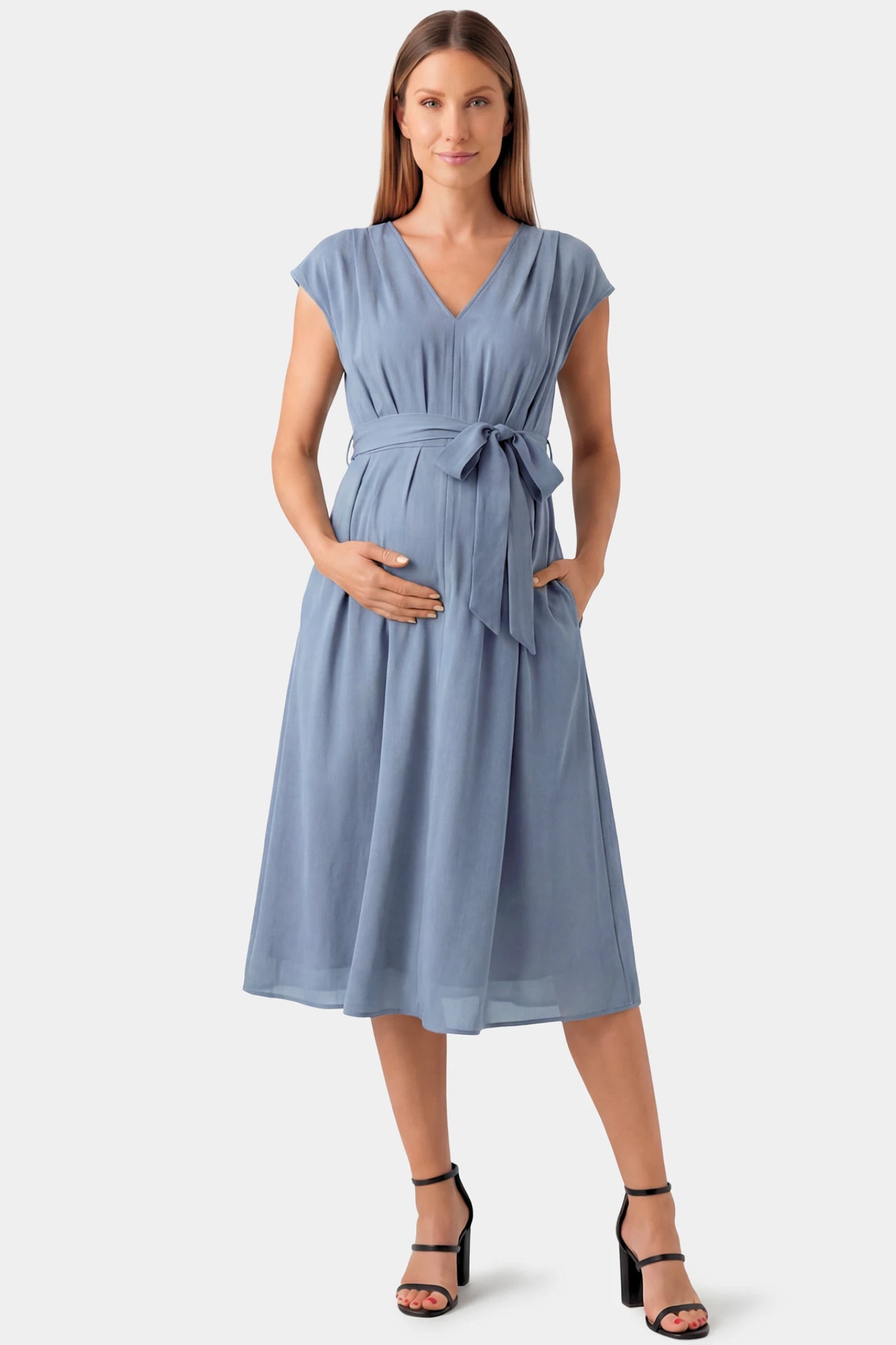 Cap Sleeves Belted Maternity Midi Dress Cap Sleeves Belted Maternity Midi Dress in light blue featuring a V-neckline, cap sleeves, and a self-tie waist belt on a pregnant model.
