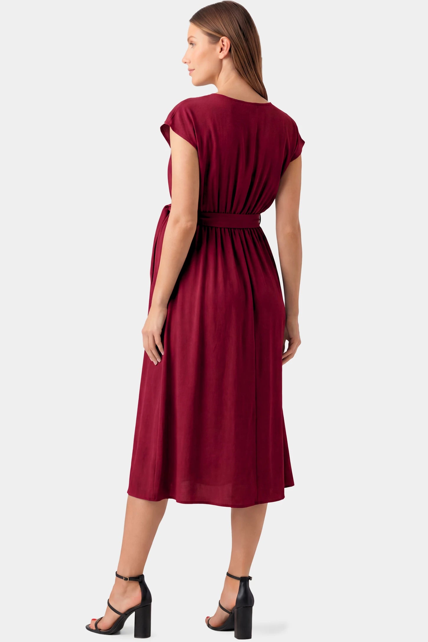 Cap Sleeves Belted Maternity Midi Dress Cap Sleeves Belted Maternity Midi Dress in wine red featuring cap sleeves, and a self-tie waist belt on a pregnant model.
