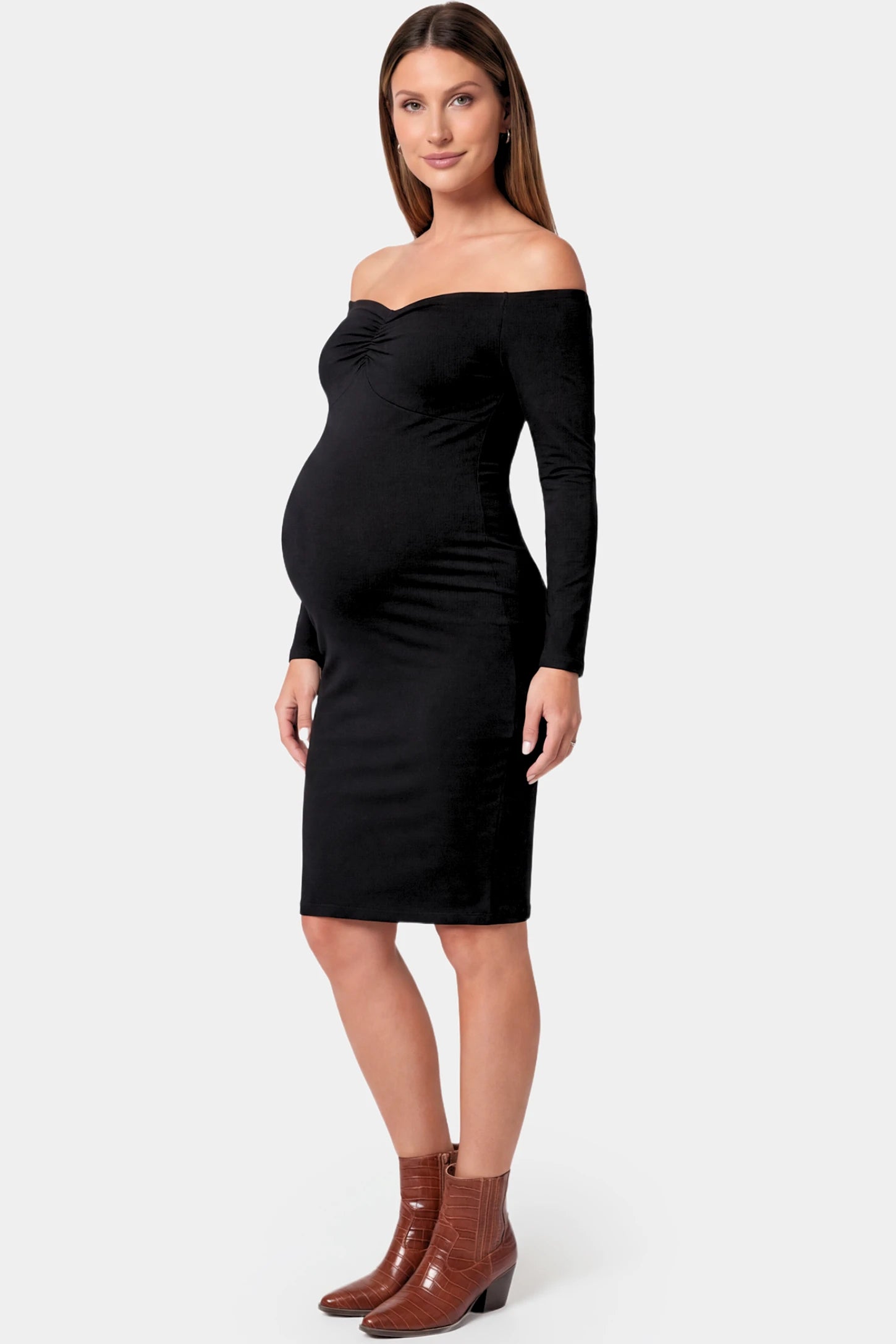 Off-Shoulder Bodycon Maternity Midi Dress in black featuring sweetheart neckline and long sleeves on a pregnant model.