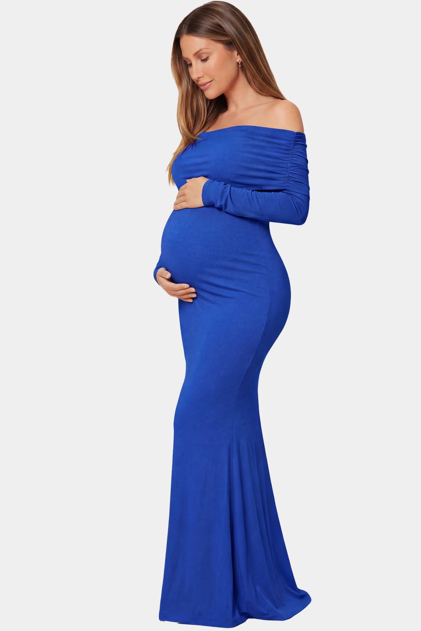 Off-the-Shoulder Long Sleeve Bodycon Maxi Maternity Dress Off-the-shoulder long sleeve bodycon maxi maternity dress in blue featuring fitted silhouette in full body side view on a pregnant model