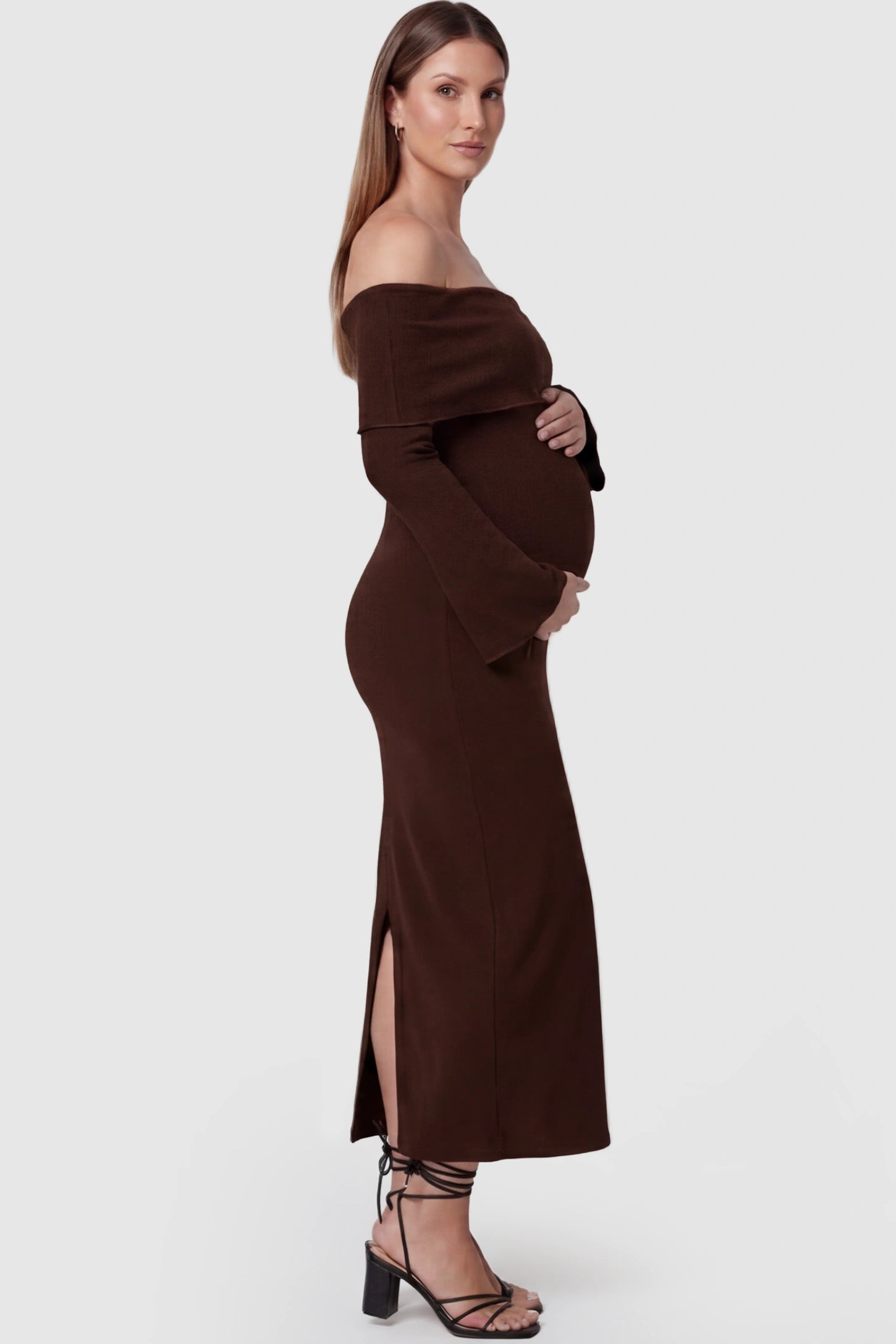 Ruched Off-shoulder Bodycon Maternity Midi Dress Ruched off-shoulder bodycon maternity midi dress in coffee with ruched side detailing, side view on pregnant model