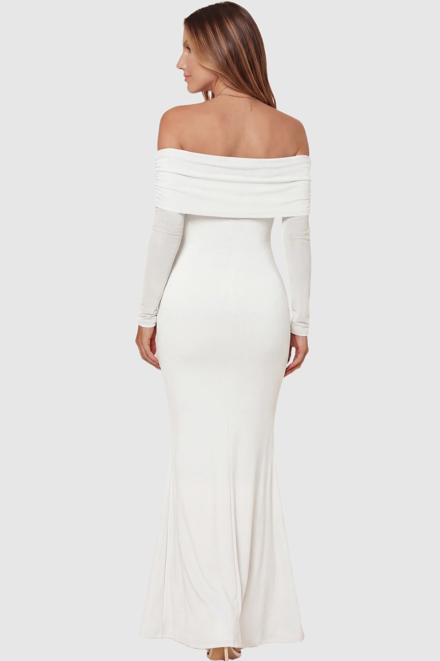 Off-the-Shoulder Long Sleeve Bodycon Maxi Maternity Dress Off-the-shoulder long sleeve bodycon maxi maternity dress in white featuring fitted silhouette in full body back view on a pregnant model