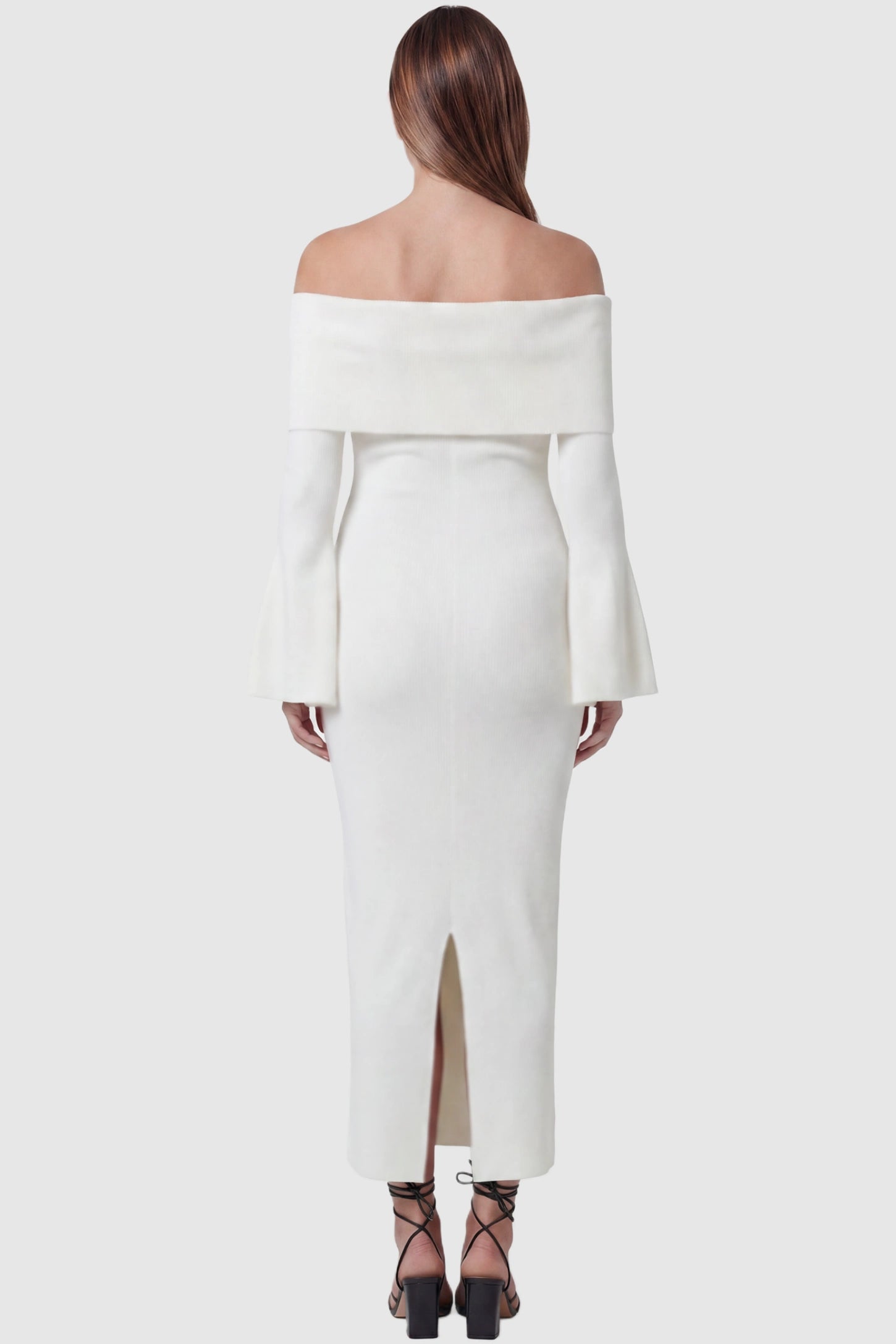 Ruched Off-shoulder Bodycon Maternity Midi Dress Ruched off-shoulder bodycon maternity midi dress in white with long sleeves and back slit, back view on pregnant model