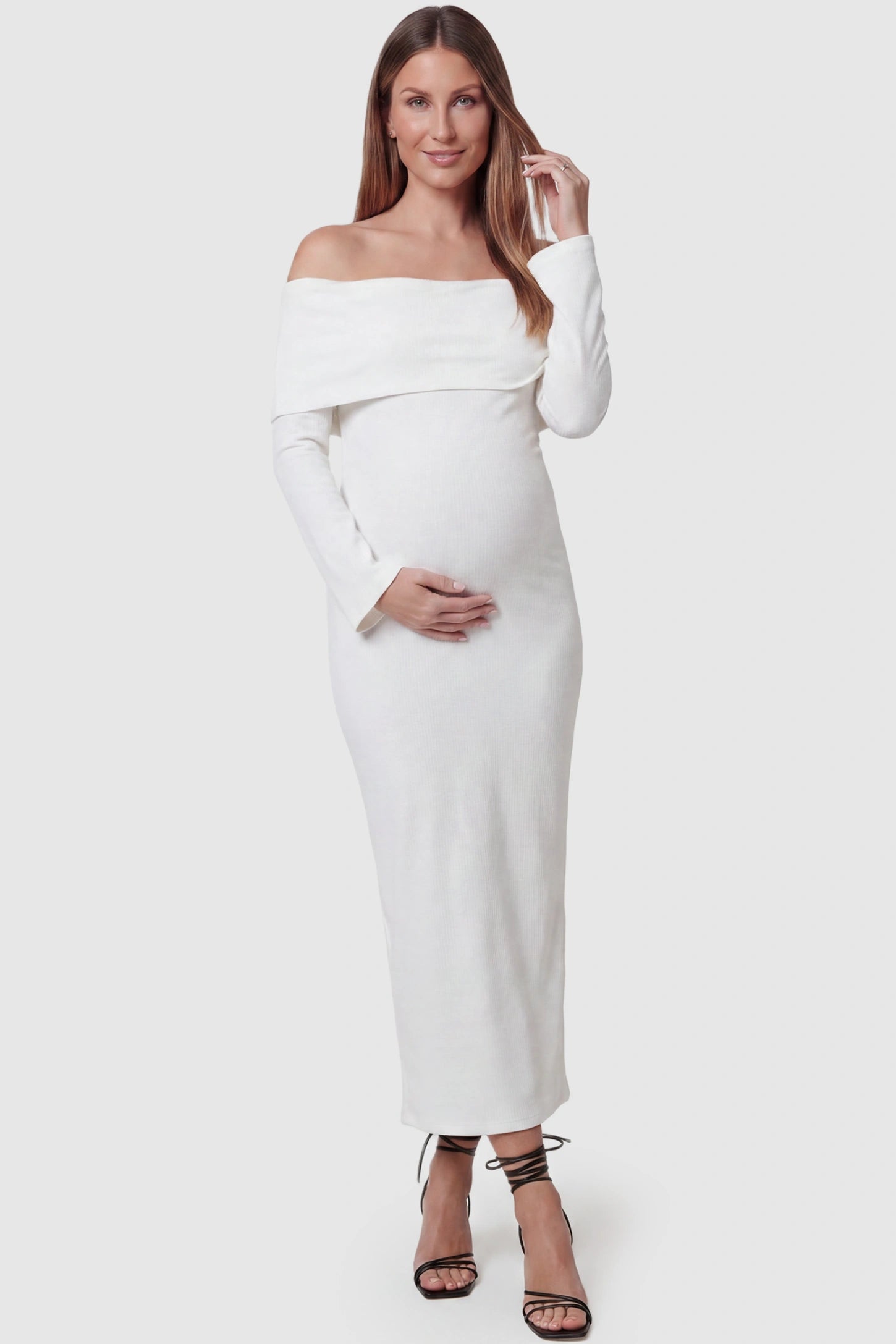 Ruched Off-shoulder Bodycon Maternity Midi Dress Ruched off-shoulder bodycon maternity midi dress in white with off-shoulder neckline, front view on pregnant model