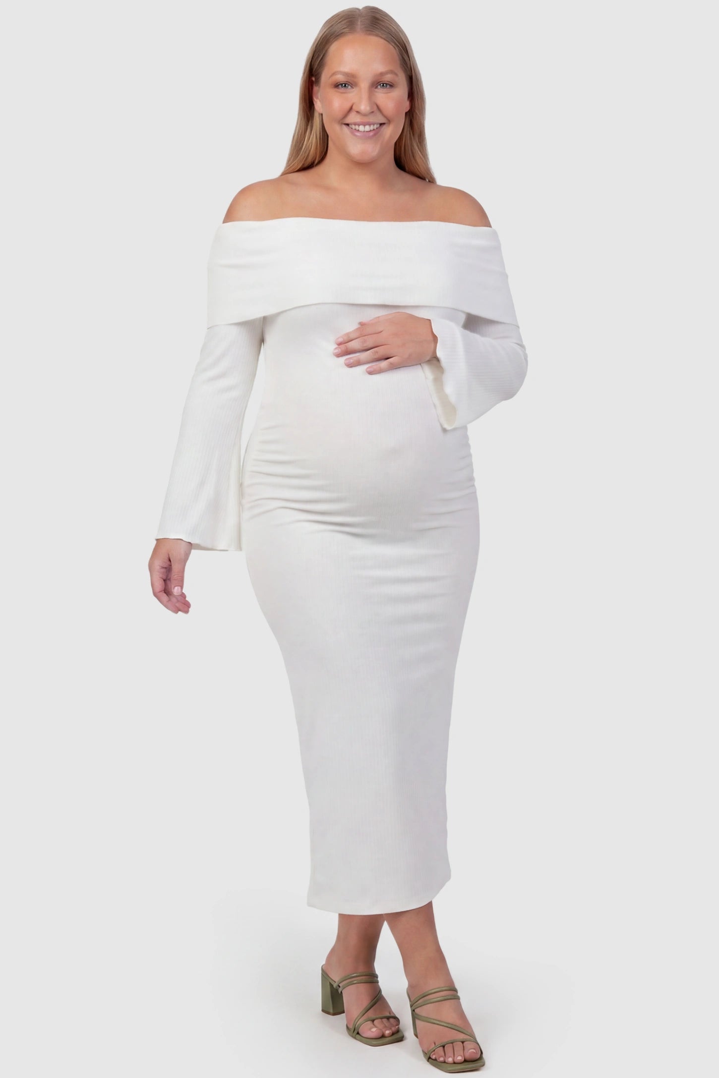 Ruched Off-shoulder Bodycon Maternity Midi Dress Ruched off-shoulder bodycon maternity midi dress in white with off-shoulder neckline, front view on plus-size model