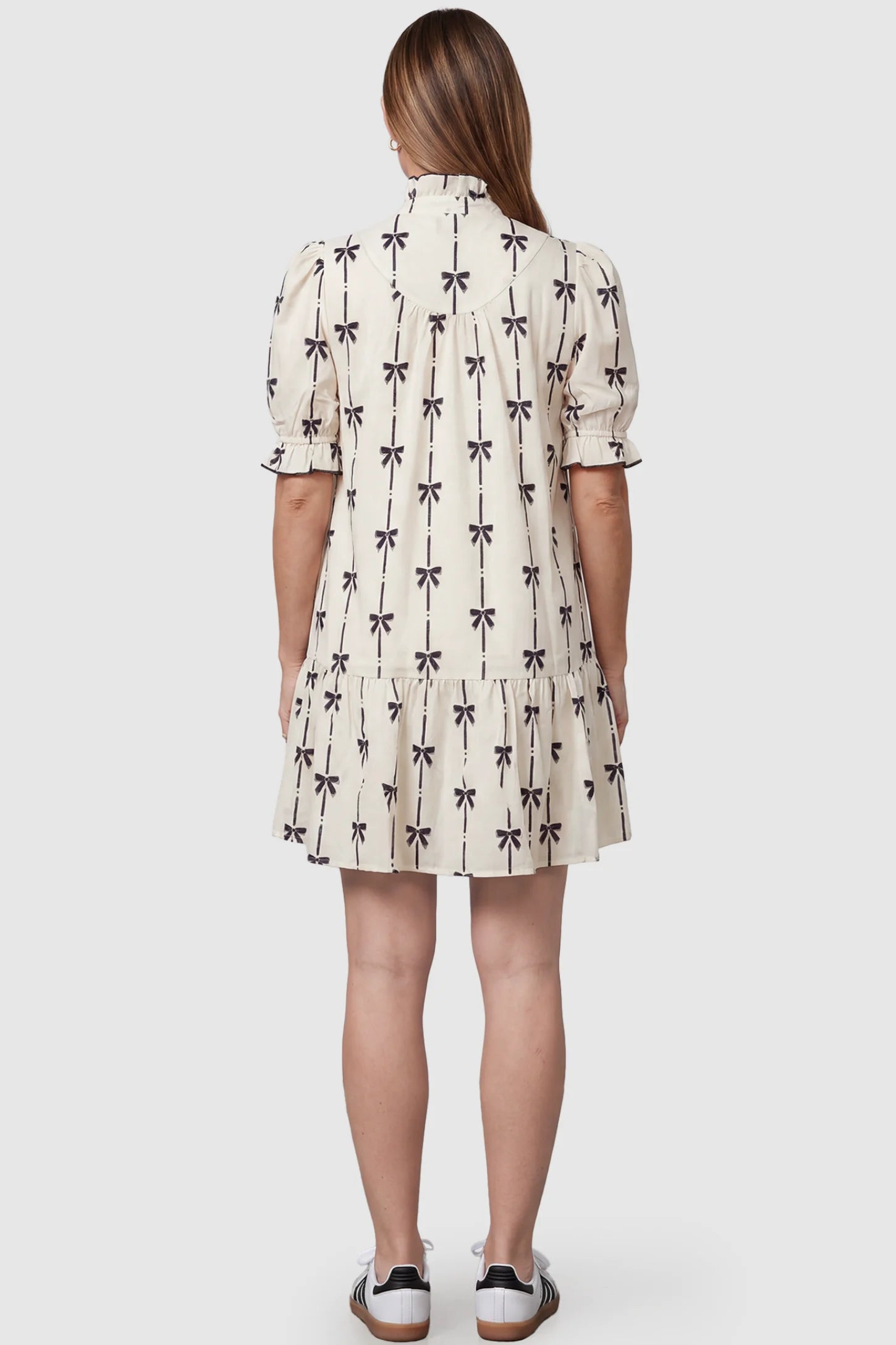 Bowknot Print Button-Up Neck Maternity Short Dress Bowknot print button-up neck maternity short dress in beige with bowknot print detail, back view on pregnant model