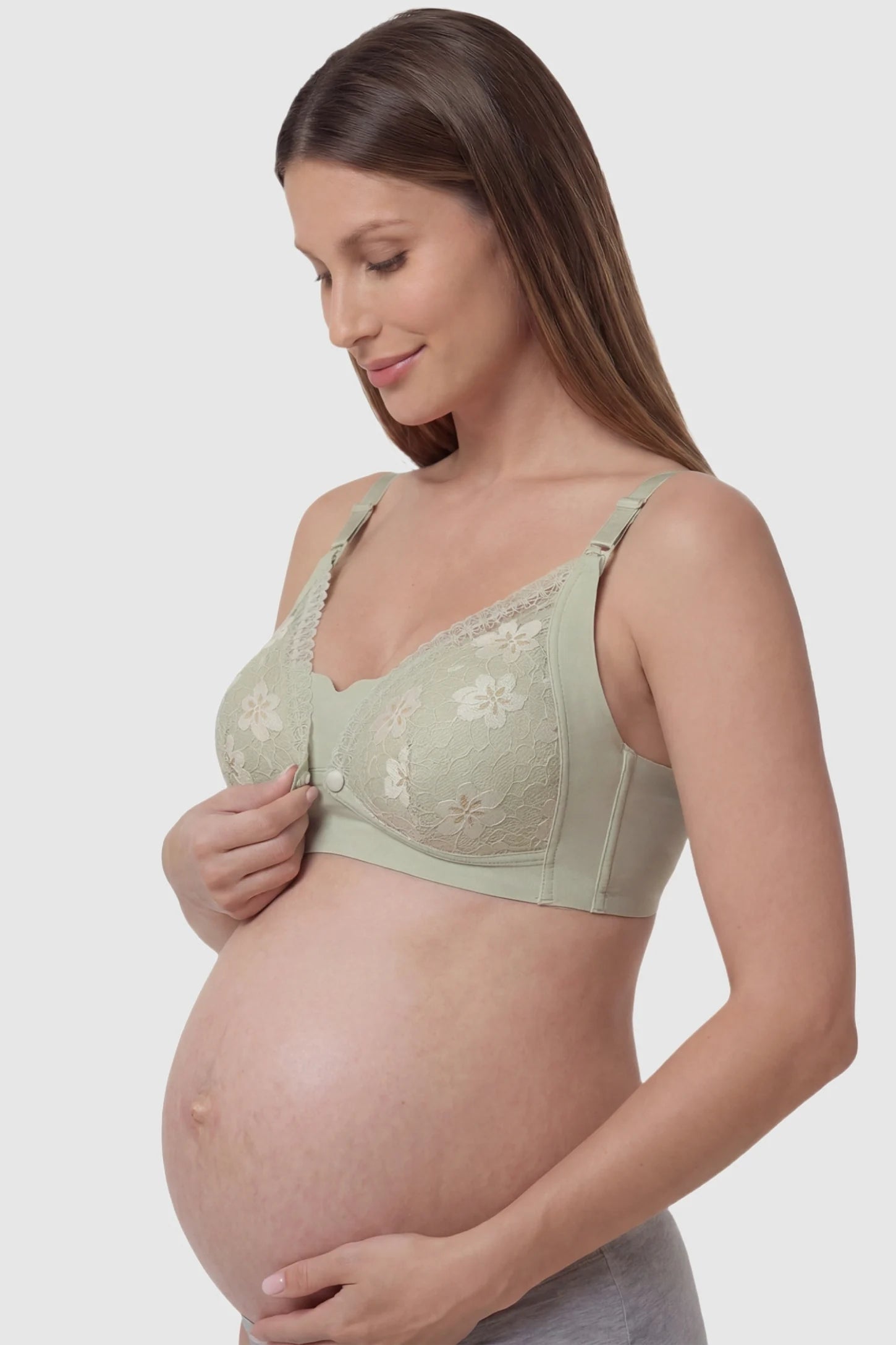 Breathable Lace U-Back Maternity Nursing Bra Green Breathable Lace U-Back Maternity Nursing Bra featuring adjustable straps and floral lace on a pregnant model, side view.