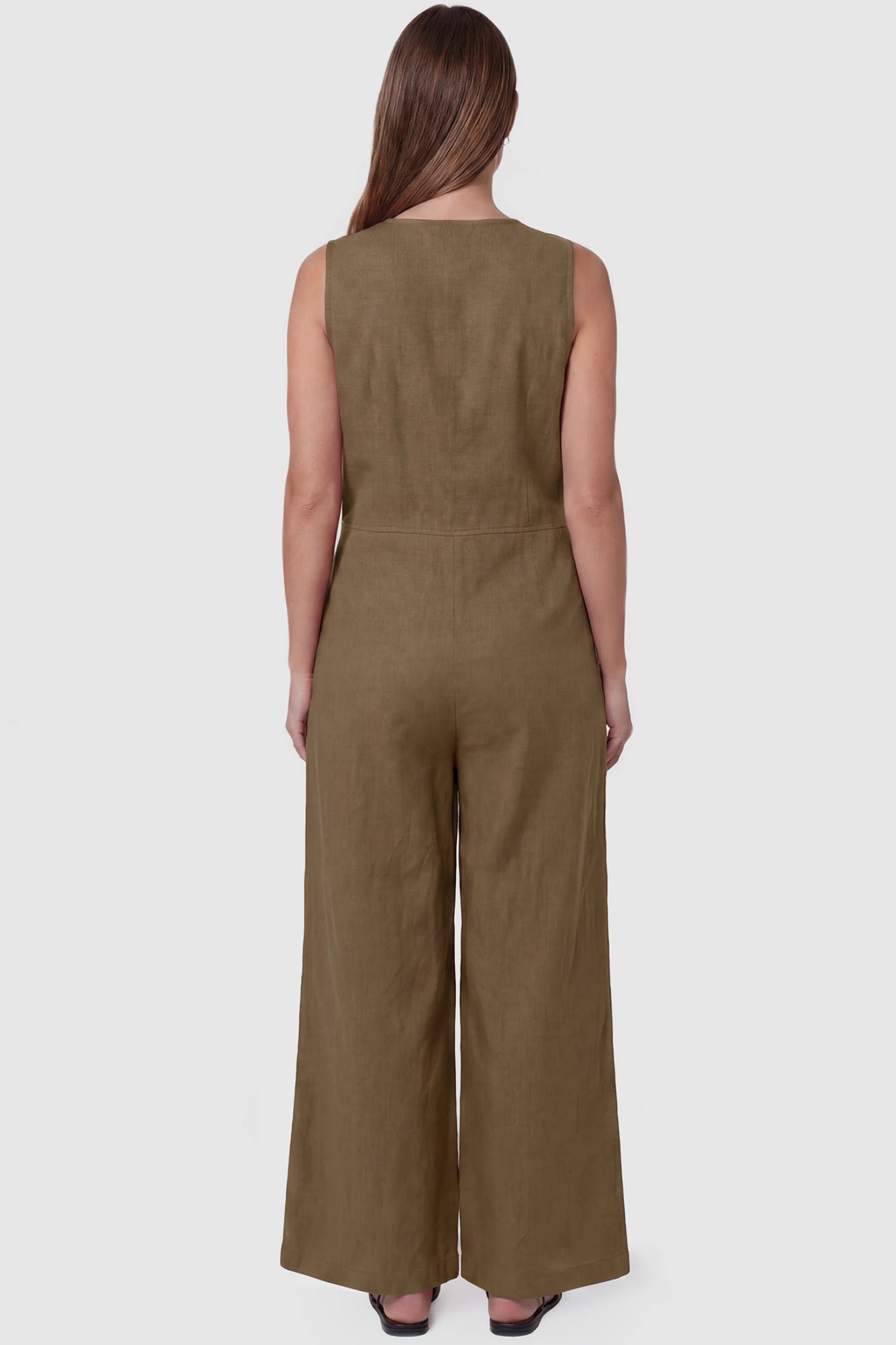 Wide-Leg V-Neck Button-Front Maternity Jumpsuit Wide-leg V-neck button-front maternity jumpsuit in brown with sleeveless cut, back view on pregnant model