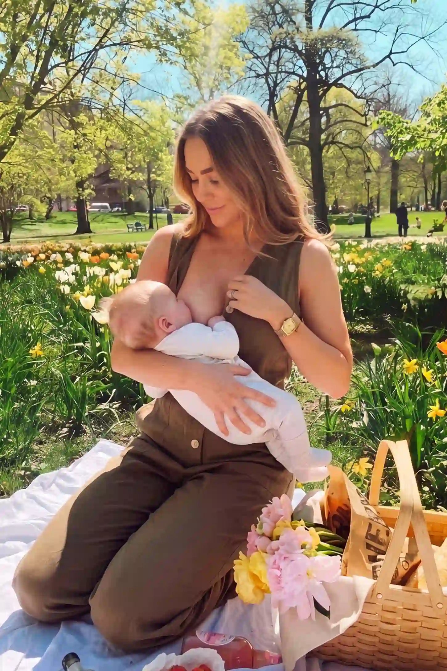Wide-Leg V-Neck Button-Front Maternity Jumpsuit Wide-leg V-neck button-front maternity jumpsuit in brown with discreet nursing access, front view on pregnant model
