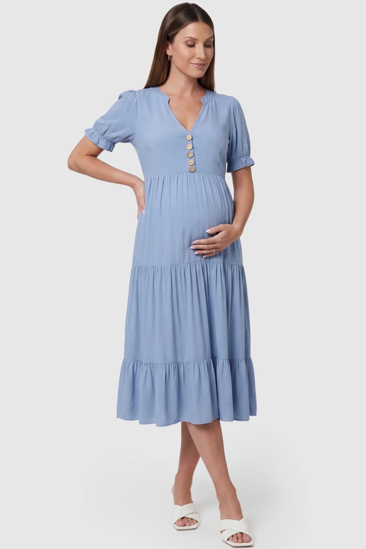 Button-Front Tiered Maternity Midi Dress in Blue featuring a stand-up collar and ruffled sleeves on a pregnant model.