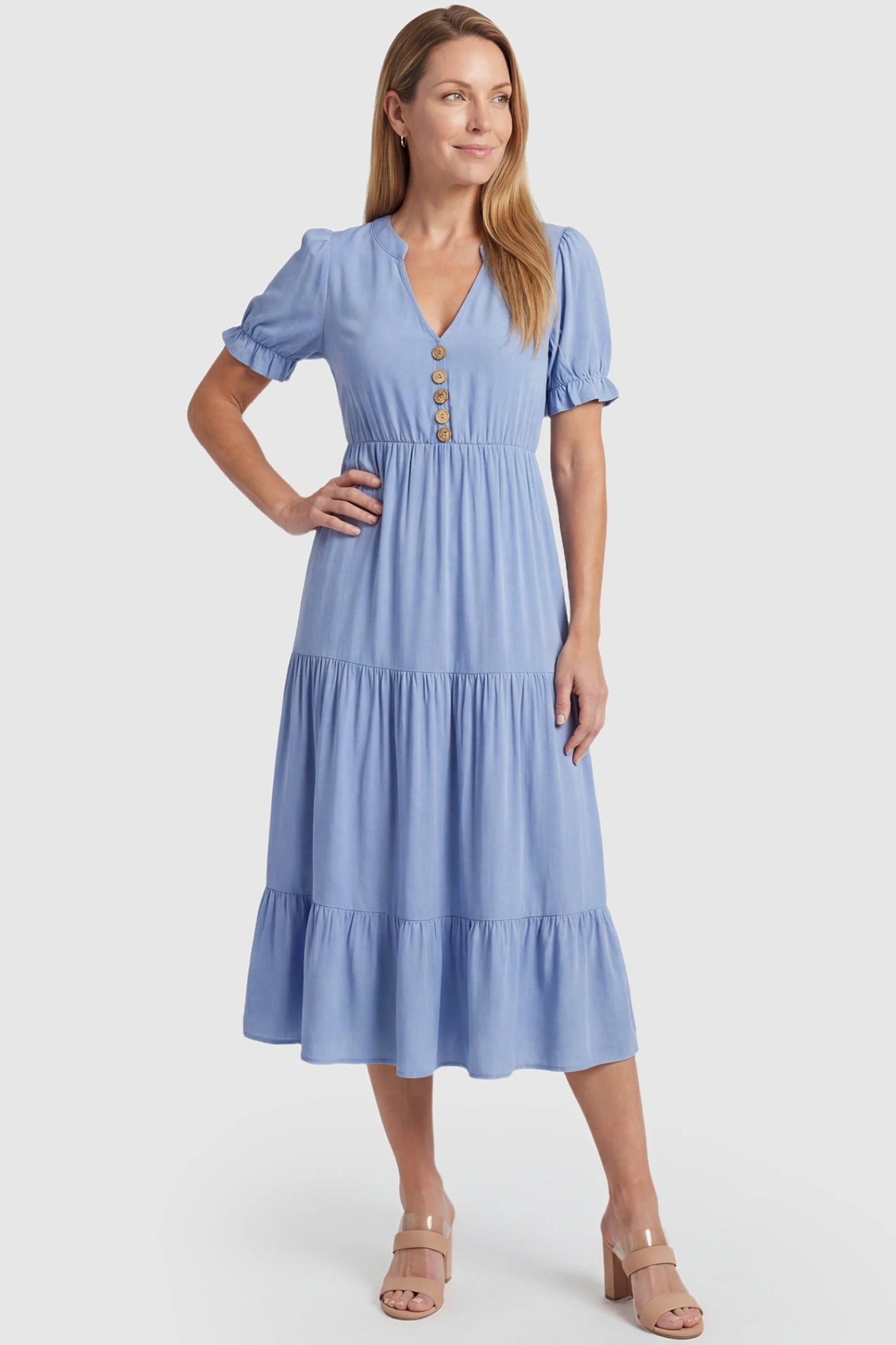 Button-Front Tiered Maternity Midi Dress Button-Front Tiered Midi Dress in Blue featuring a stand-up collar and ruffled sleeves on a non-pregnant model.