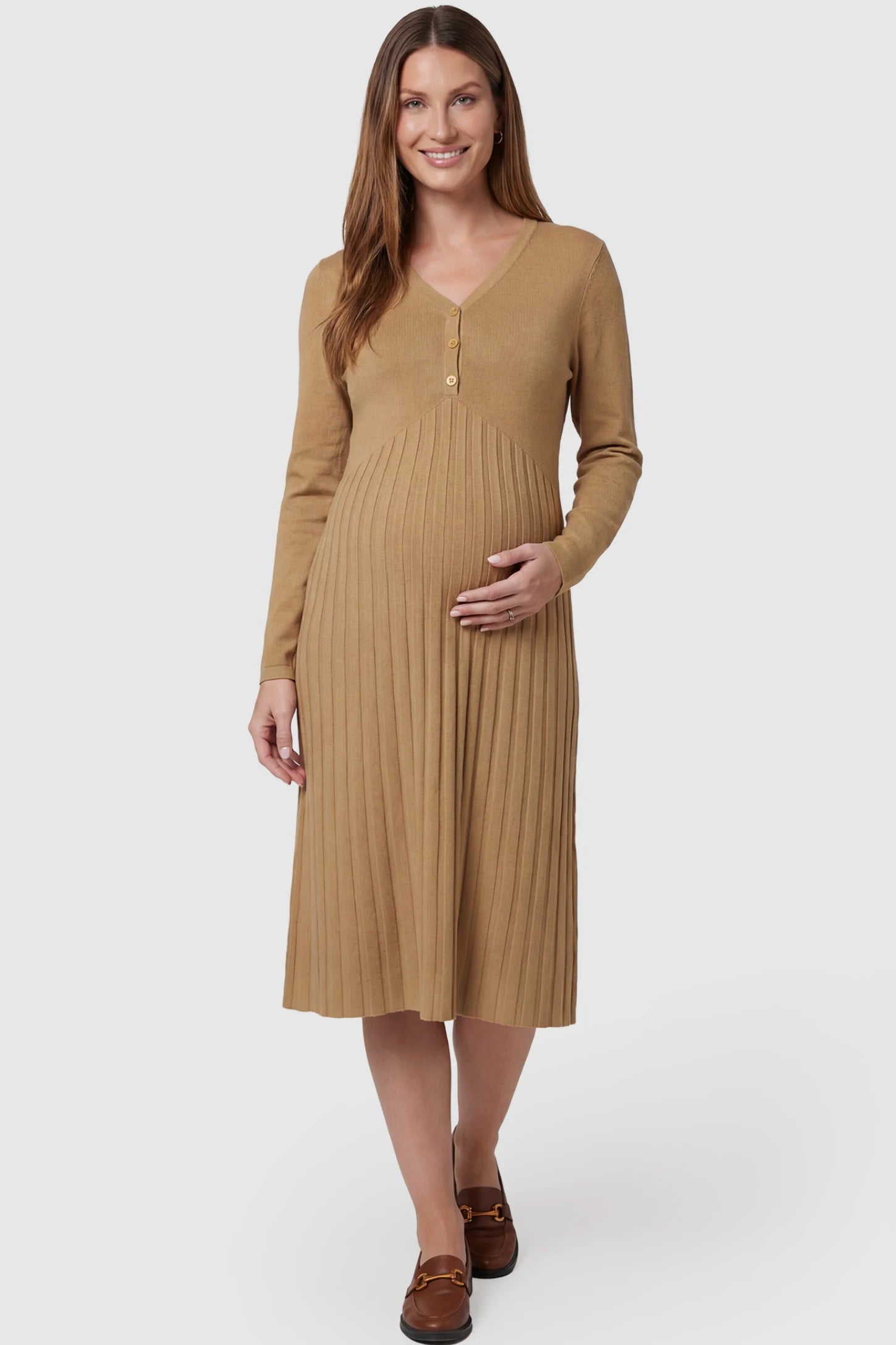 Button-Up Empire Waist Maternity Midi Dress Button-up empire waist maternity midi dress in beige with button-up front detail, front view on pregnant model
