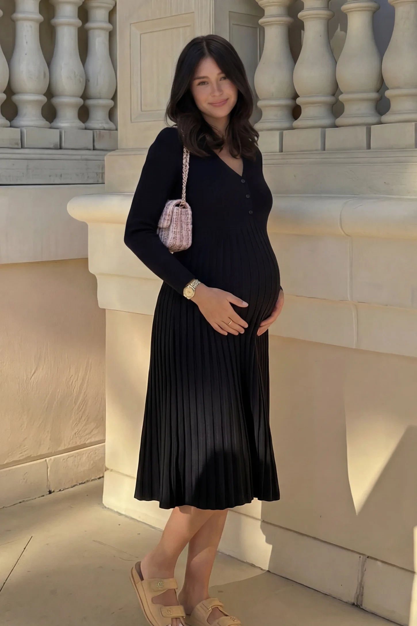 Button-Up Empire Waist Maternity Midi Dress Button-up empire waist maternity midi dress in black with button-up front detail, front view on pregnant model