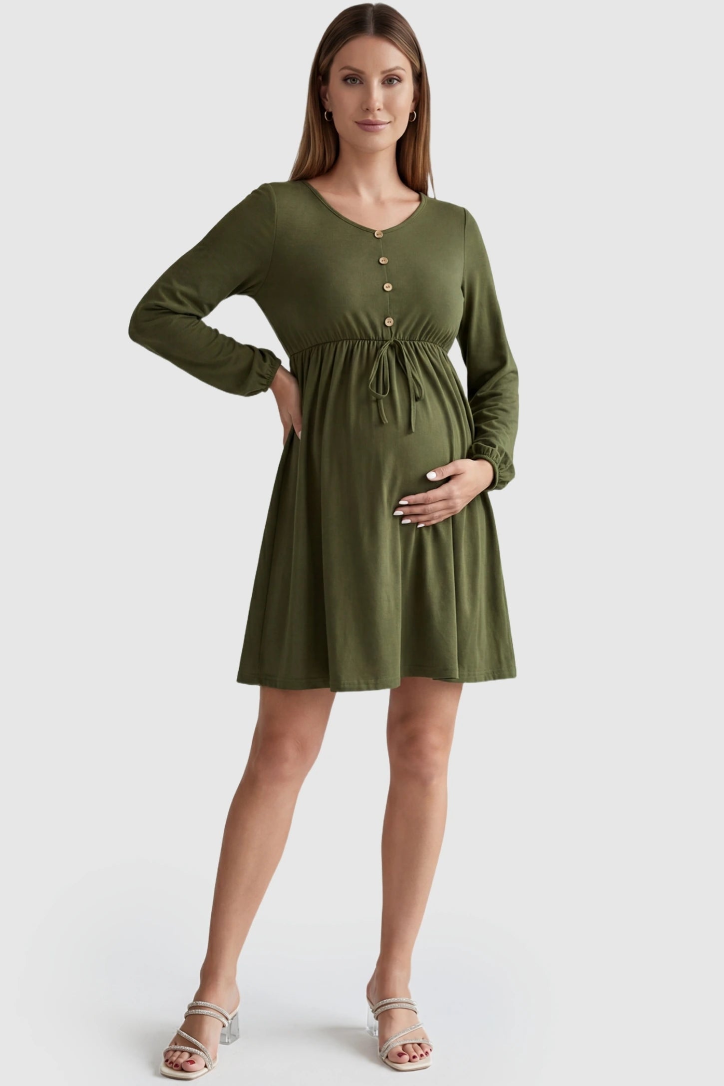 Button-Front Drawstring Waist Maternity Mini Dress Button-Front Drawstring Waist Maternity Mini Dress in Army Green featuring a gathered waist on a pregnant model, front view.