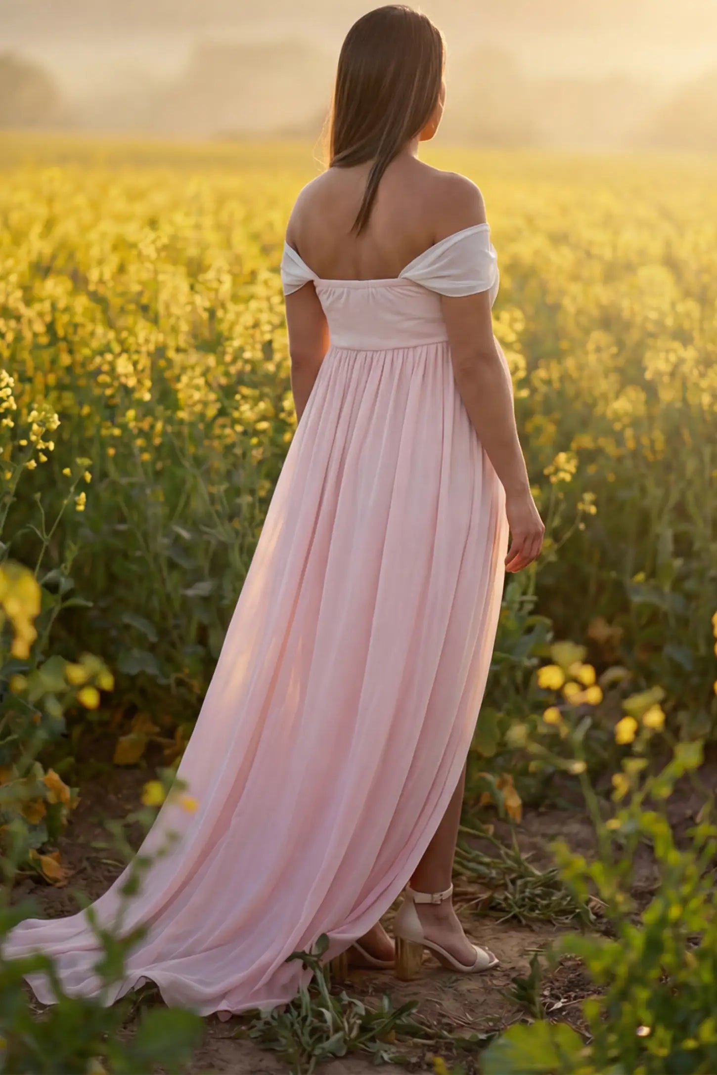 Cap Sleeve Empire Waist Maternity Photoshoot Dress Cap Sleeve Empire Waist Maternity Photoshoot Gown in pink featuring flowy skirt on pregnant model. back view