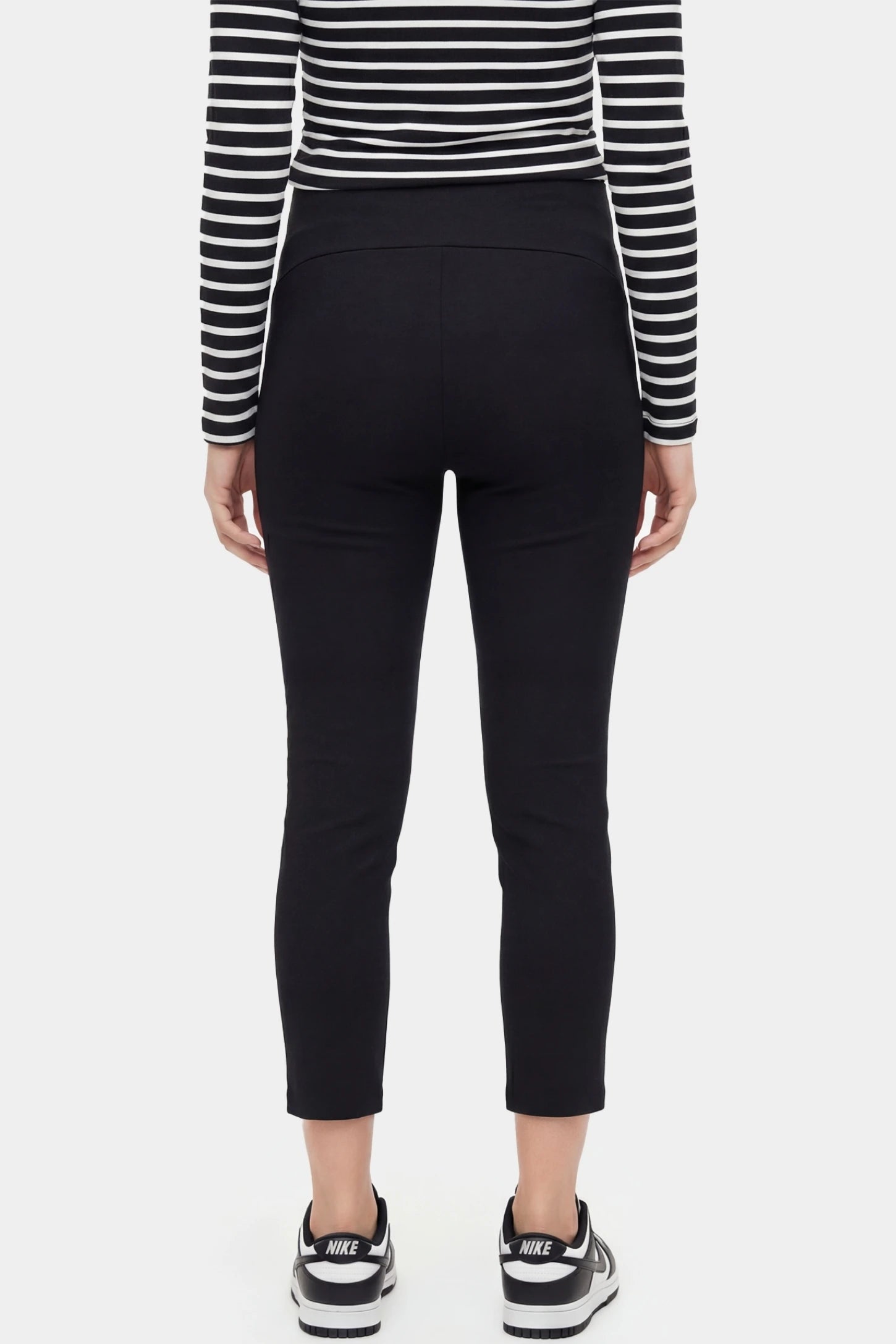 High-Waist Belly Support Loose-Fit Capri Maternity Pants High-waist belly support loose-fit capri maternity pants in black with wrinkle-resistant fabric, back view on pregnant model