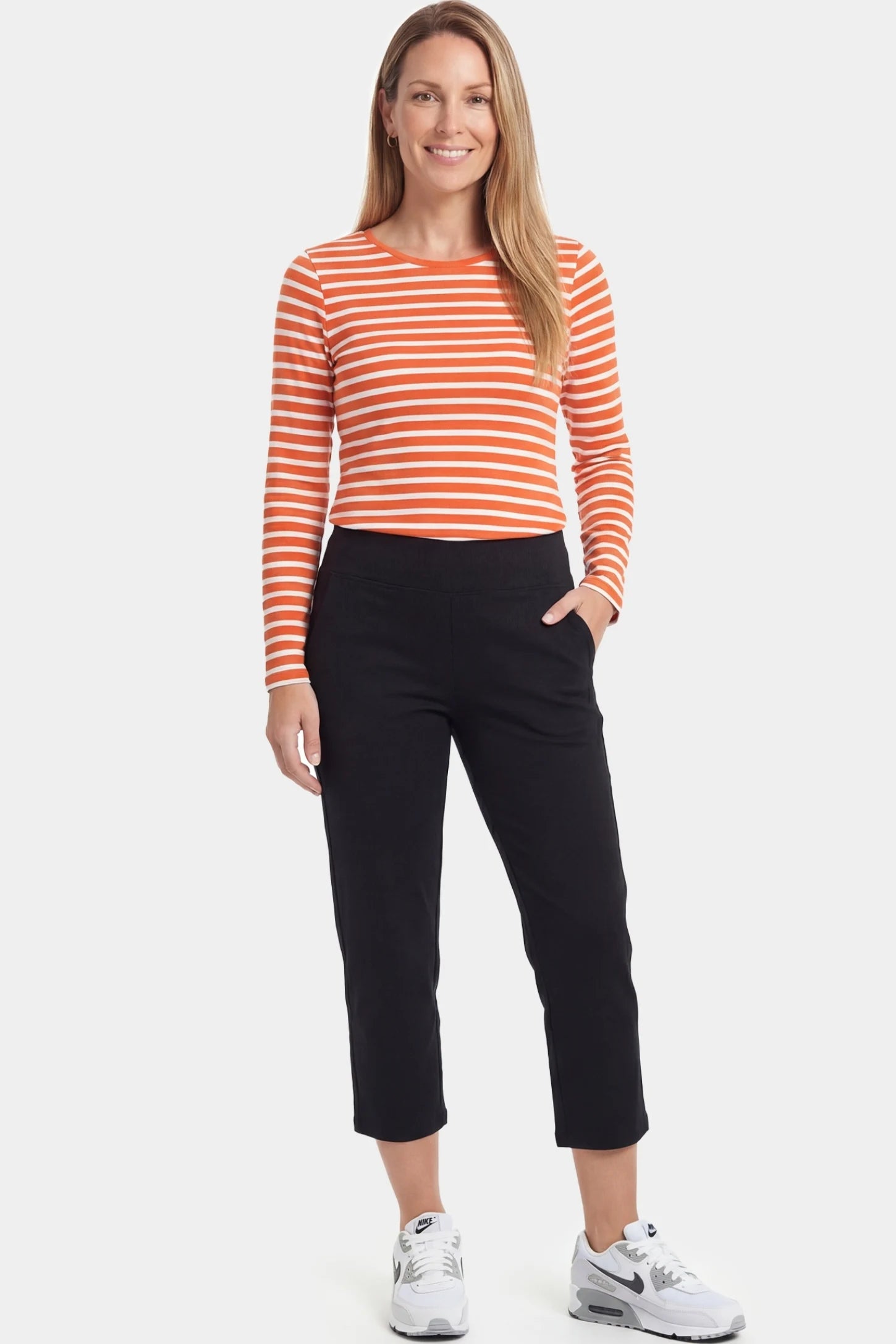 High-Waist Belly Support Loose-Fit Capri Maternity Pants High-waist belly support loose-fit capri maternity pants in black with functional side pockets, full body on postpartum model