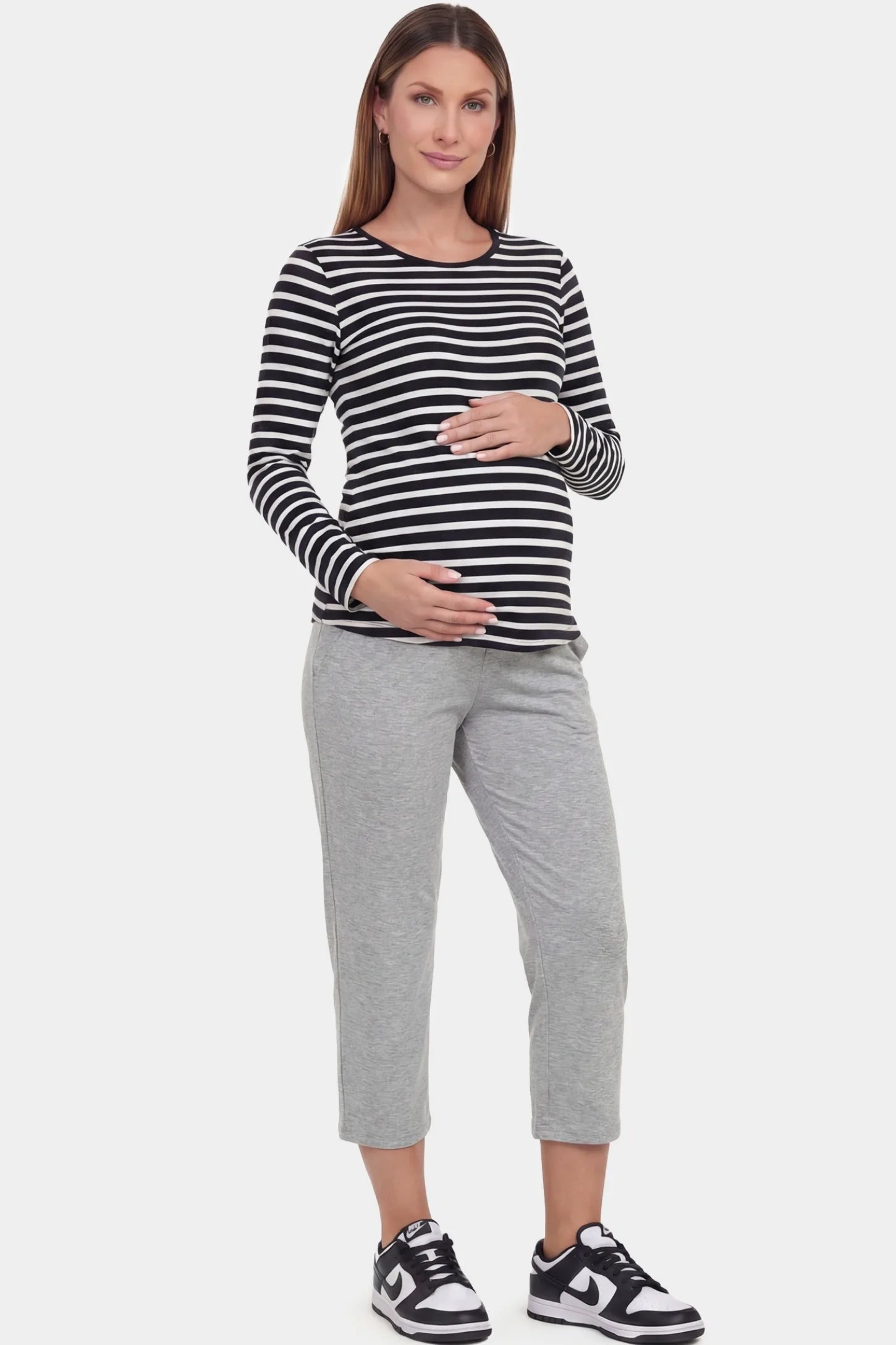 High-Waist Belly Support Loose-Fit Capri Maternity Pants High-waist belly support loose-fit capri maternity pants in light gray with relaxed silhouette, full body on pregnant model