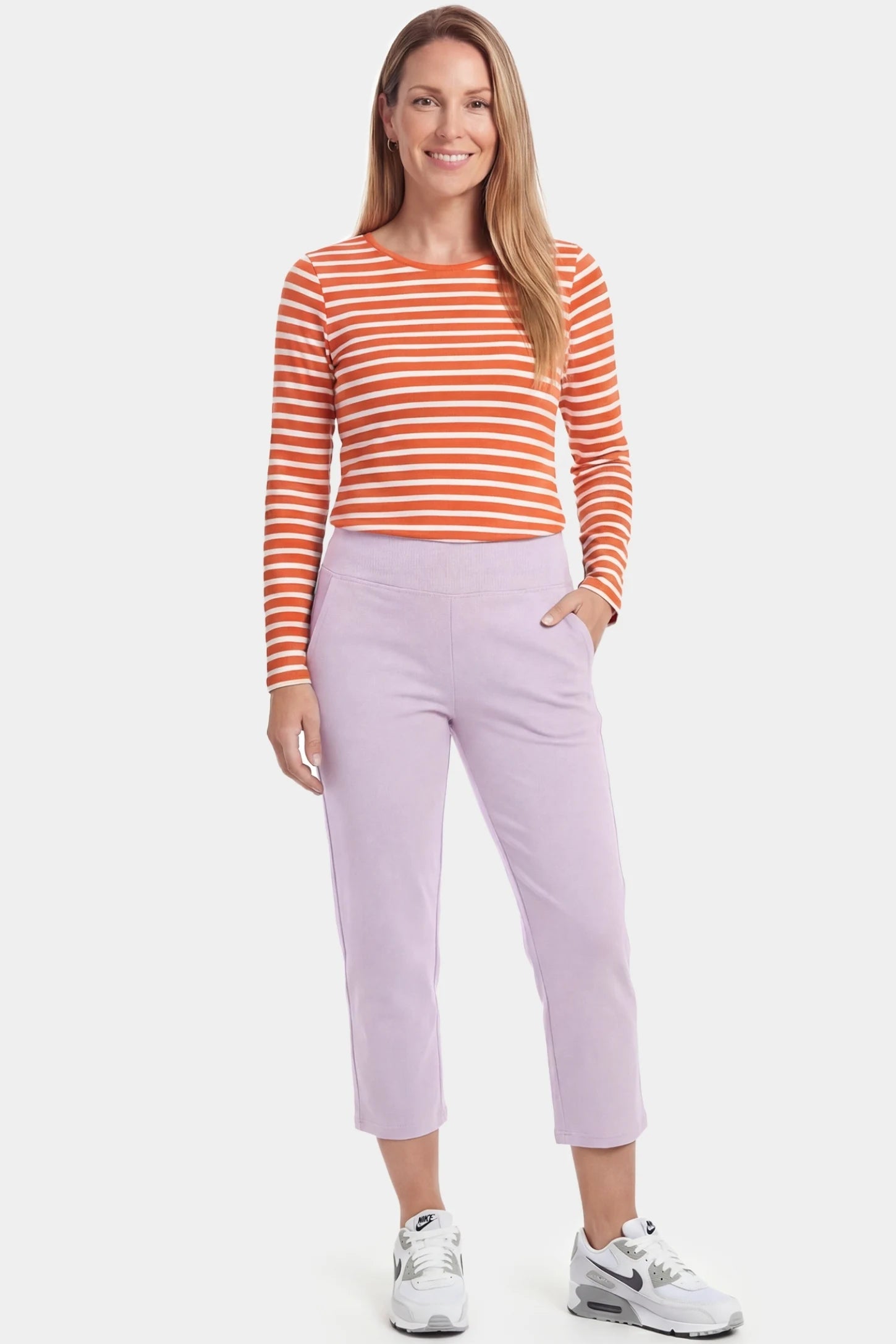 High-Waist Belly Support Loose-Fit Capri Maternity Pants High-waist belly support loose-fit capri maternity pants in light purple with functional side pockets, full body on postpartum model