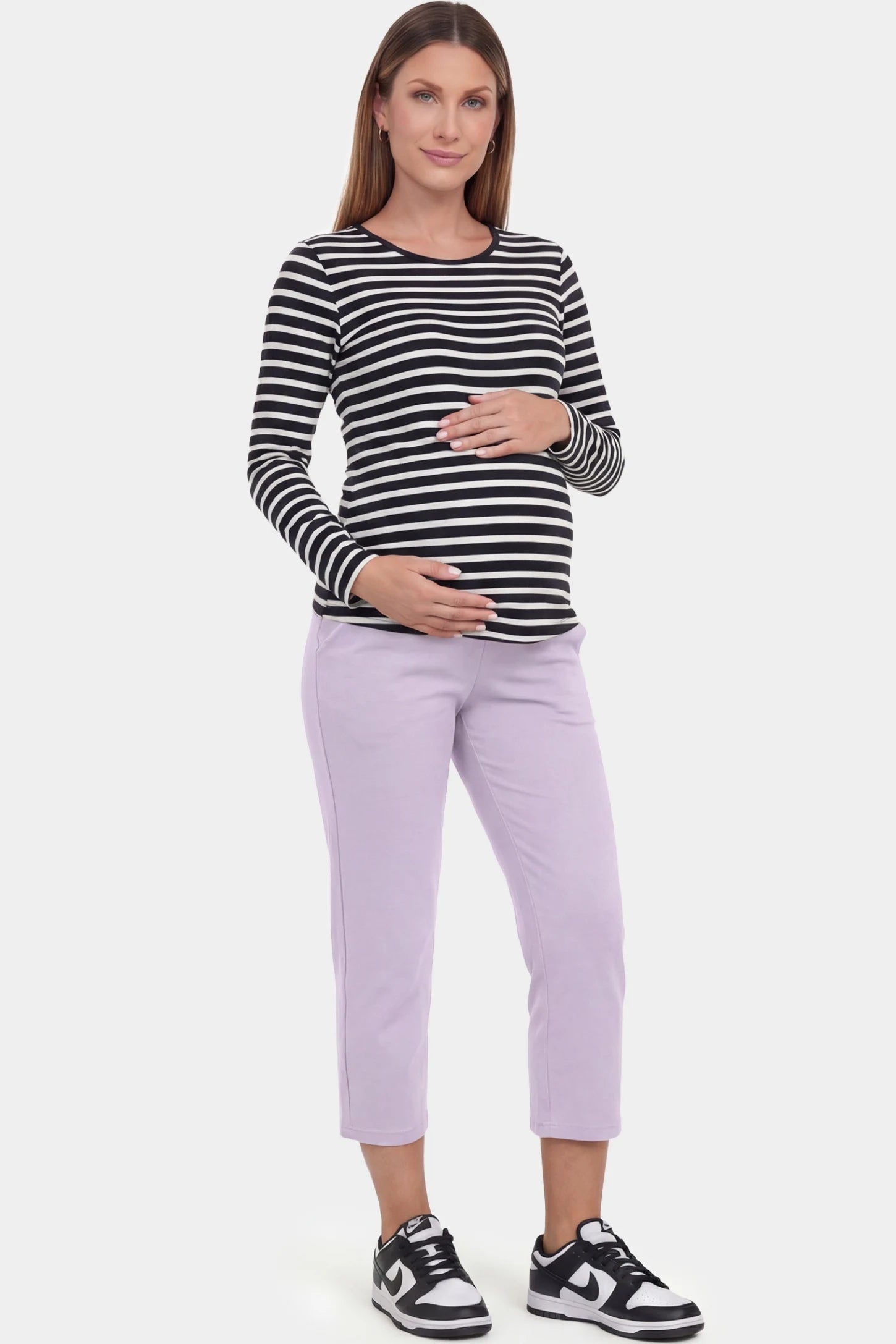 High-Waist Belly Support Loose-Fit Capri Maternity Pants High-waist belly support loose-fit capri maternity pants in light purple with relaxed silhouette, full body on pregnant model