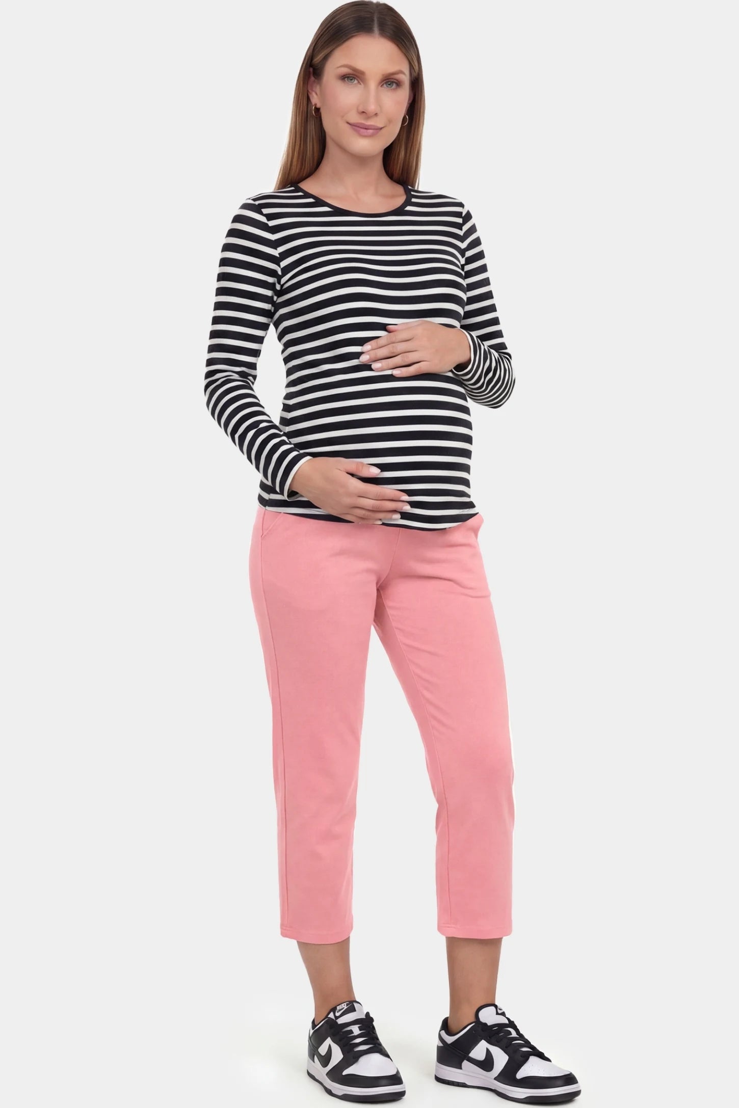 High-Waist Belly Support Loose-Fit Capri Maternity Pants High-waist belly support loose-fit capri maternity pants in pink with relaxed silhouette, full body on pregnant model