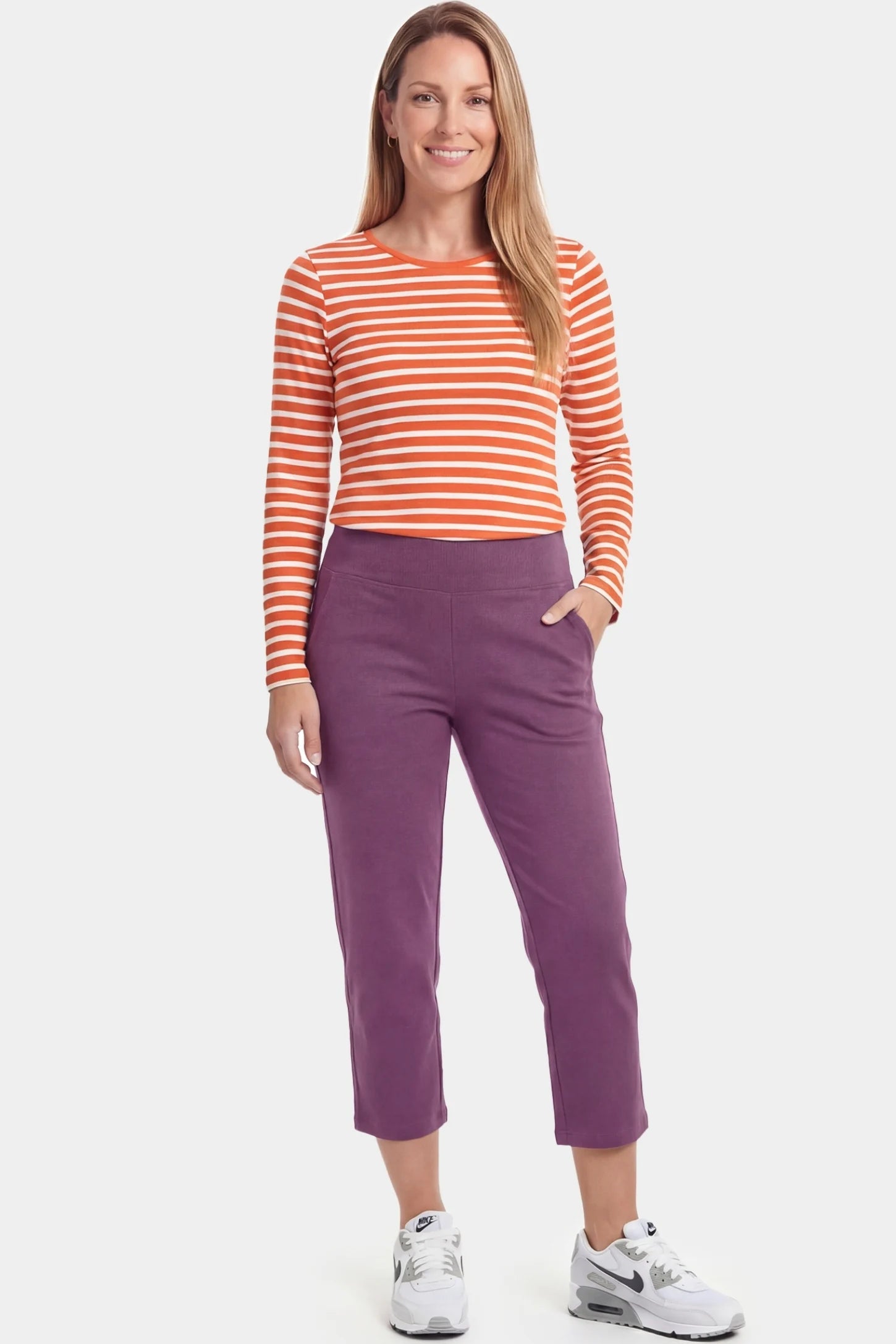 High-Waist Belly Support Loose-Fit Capri Maternity Pants High-waist belly support loose-fit capri maternity pants in purple with functional side pockets, full body on postpartum model