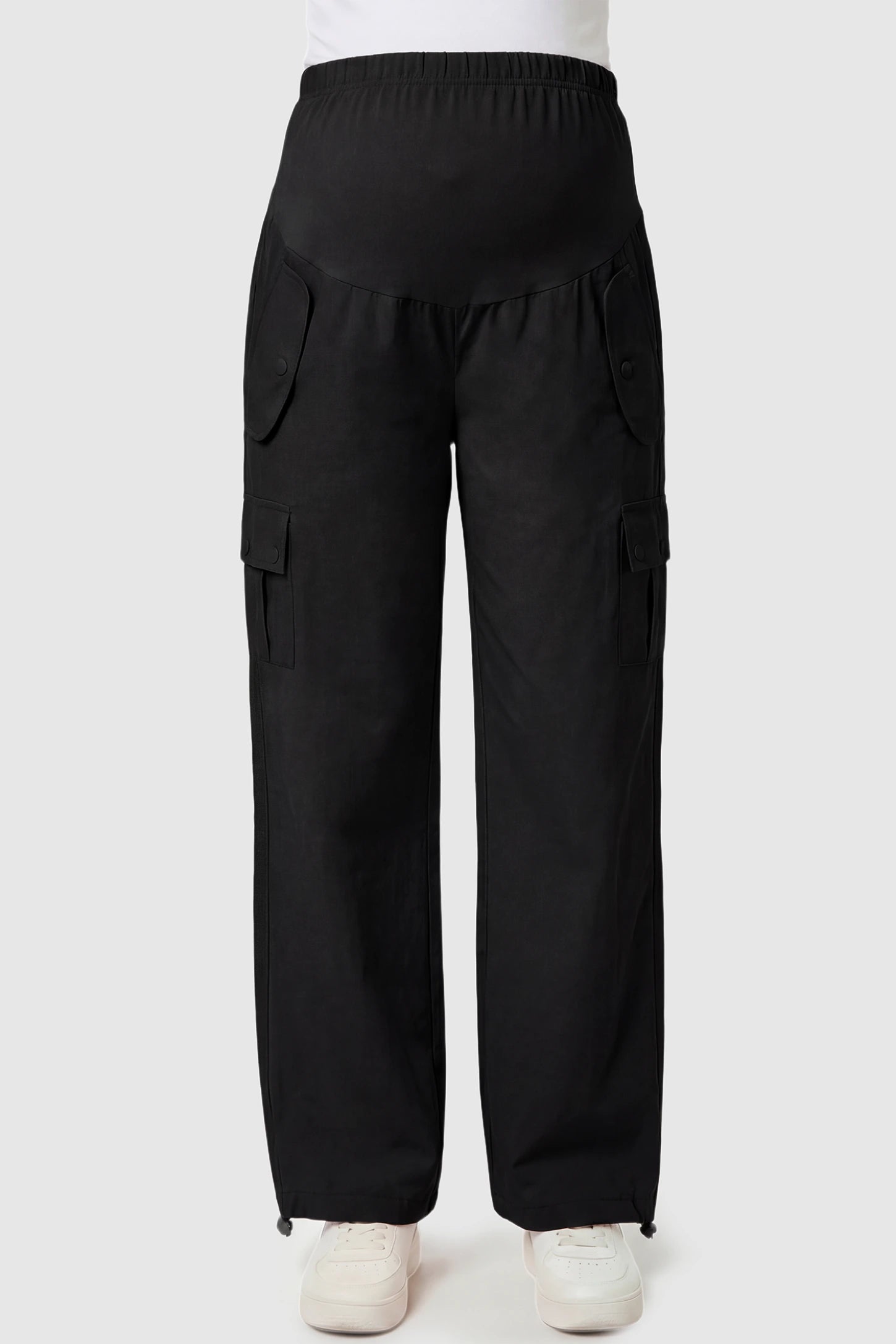 Ice Silk Cargo Maternity Pants Ice Silk Cargo Maternity Pants in black featuring full belly panel, cargo pockets, and relaxed full-length fit on pregnant model front view.