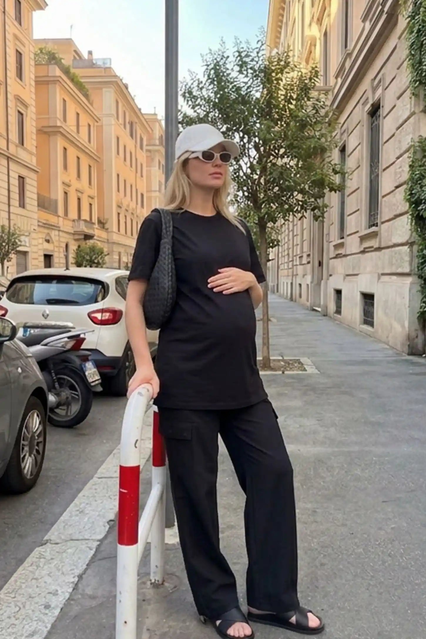 Ice Silk Cargo Maternity Pants Ice Silk Cargo Maternity Pants in black featuring full belly panel, cargo pockets, and relaxed full-length fit on pregnant model front view.