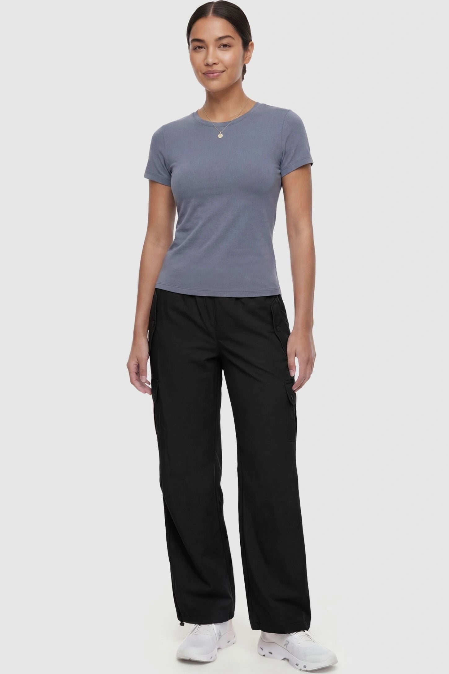 Ice Silk Cargo Maternity Pants Ice Silk Cargo Maternity Pants in black featuring full belly panel, cargo pockets, and relaxed full-length fit on non pregnant model front view.