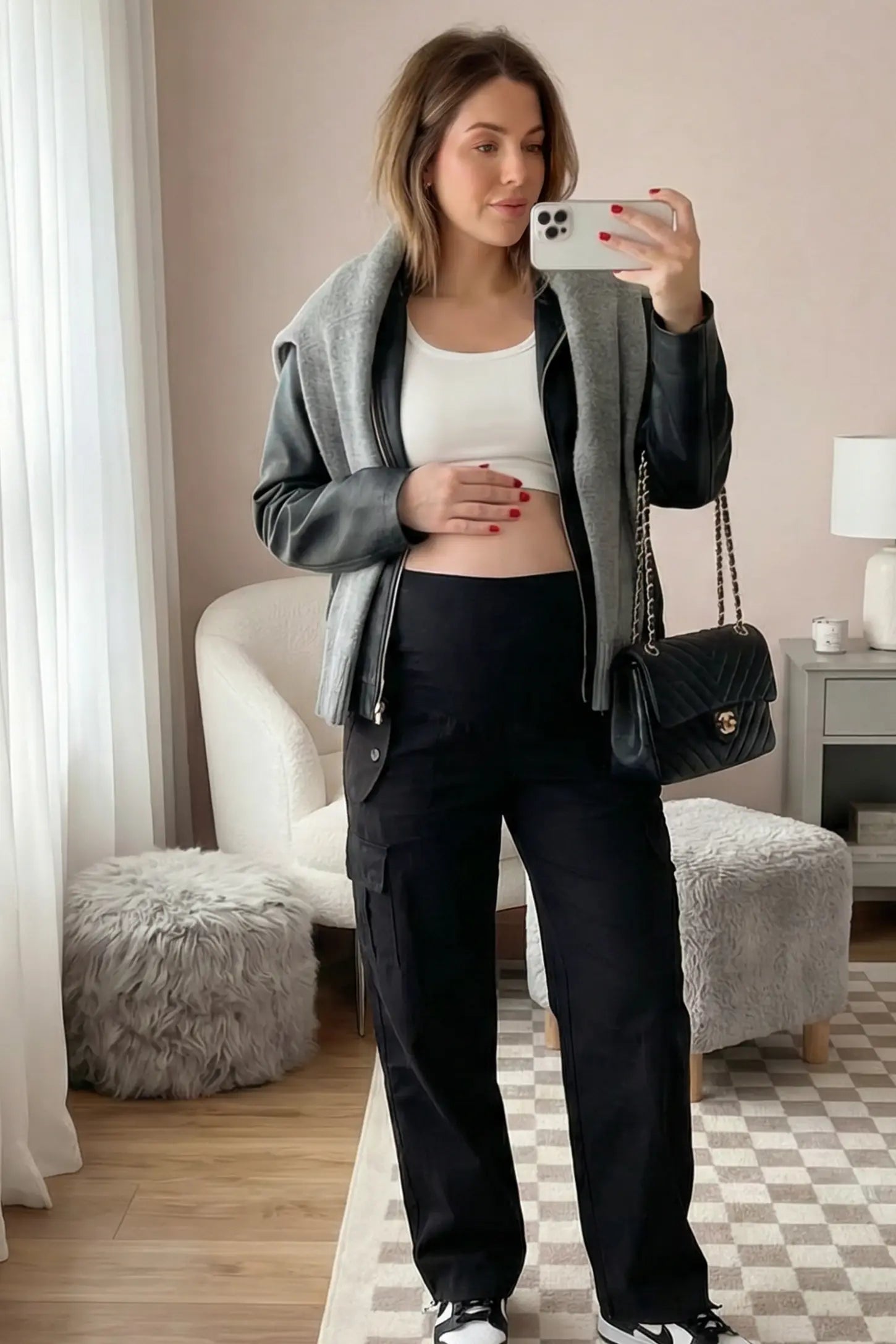 Ice Silk Cargo Maternity Pants Ice Silk Cargo Maternity Pants in black featuring full belly panel, cargo pockets, and relaxed full-length fit on pregnant model front view.