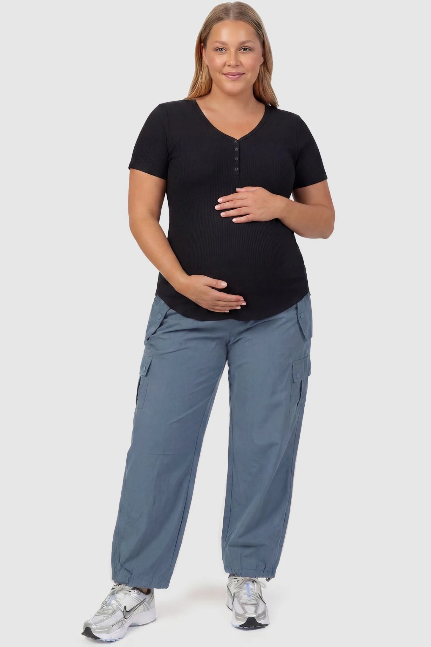 Ice Silk Cargo Maternity Pants Ice Silk Cargo Maternity Pants in gray featuring full belly panel, cargo pockets, and relaxed full-length fit on plus size pregnant model front view.