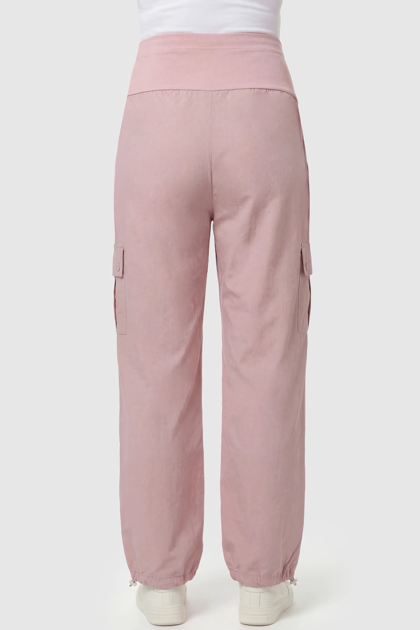 Ice Silk Cargo Maternity Pants Ice Silk Cargo Maternity Pants in pink featuring full belly panel, cargo pockets, and relaxed full-length fit on pregnant model back view.
