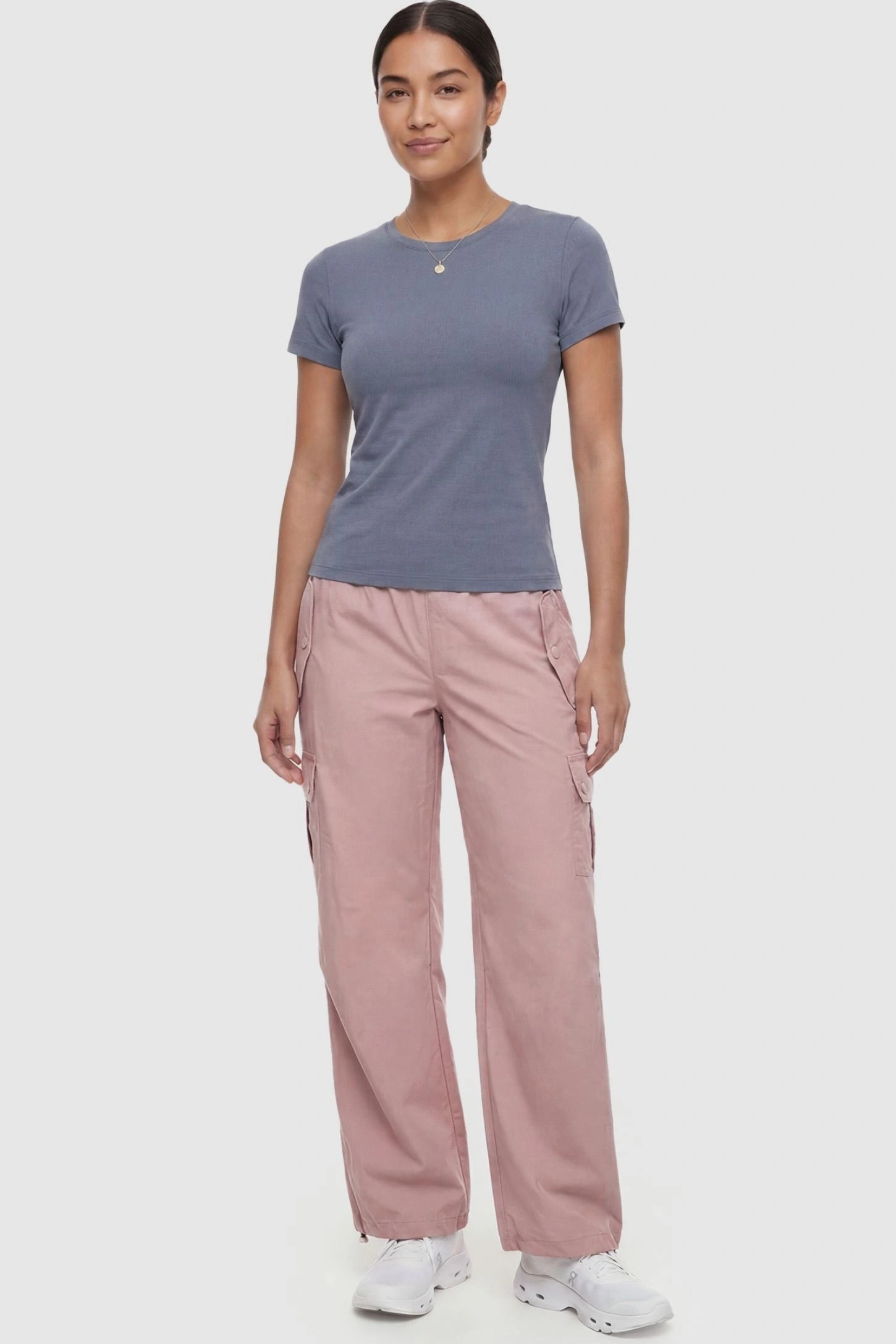 Ice Silk Cargo Maternity Pants Ice Silk Cargo Maternity Pants in pink featuring full belly panel, cargo pockets, and relaxed full-length fit on non pregnant model front view.