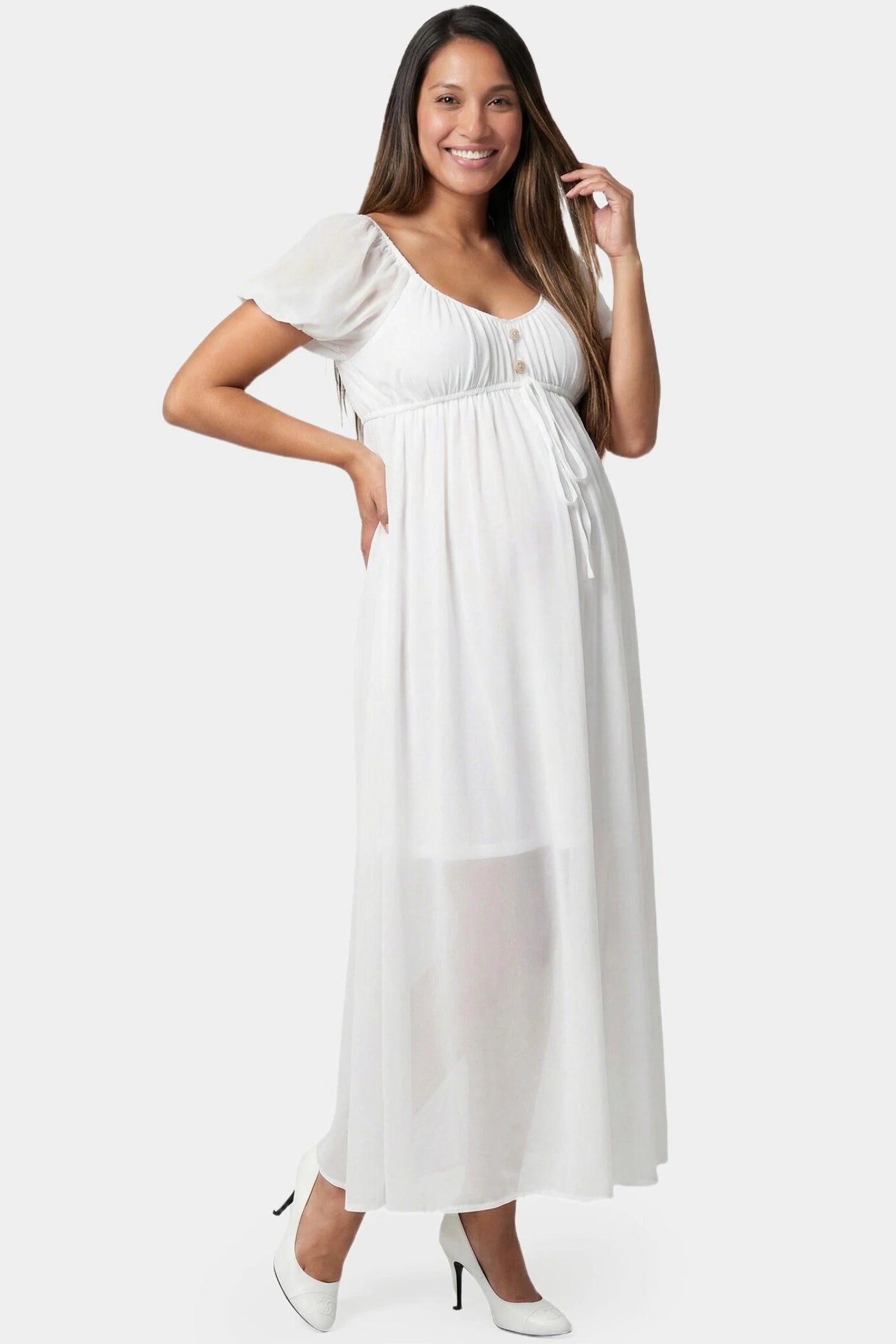 Chiffon Puff Sleeve Scoop Neck Maxi Maternity Dress in white featuring flowing full skirt in full body front view on a pregnant model