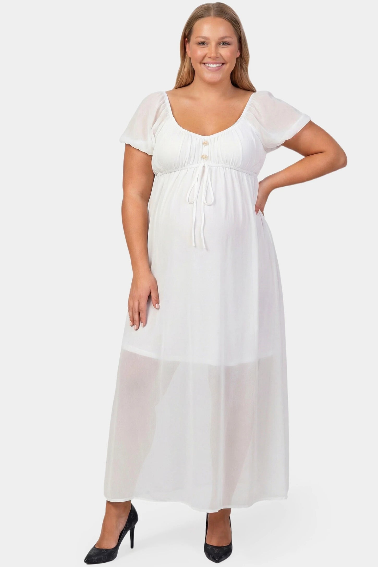 Chiffon Puff Sleeve Scoop Neck Maxi Maternity Dress Chiffon Puff Sleeve Scoop Neck Maxi Maternity Dress in white featuring flowing full skirt in full body front view on a plus-size model