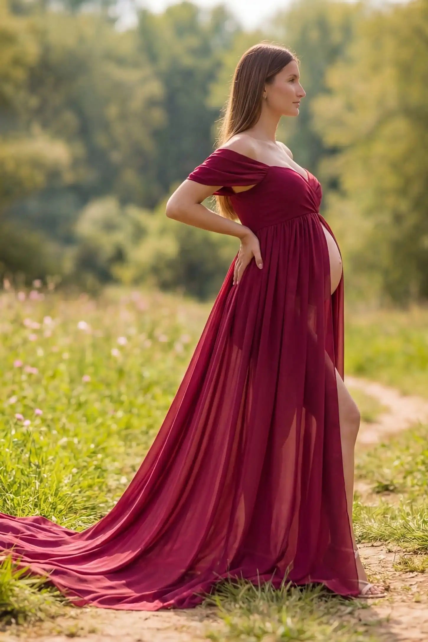 Chiffon-Finish Flowing Off-The-Shoulder Maternity Photoshoot Gown Side view of Burgundy Chiffon-Finish Flowing Off-The-Shoulder Maternity Photoshoot Gown with draped sleeves on a pregnant model.