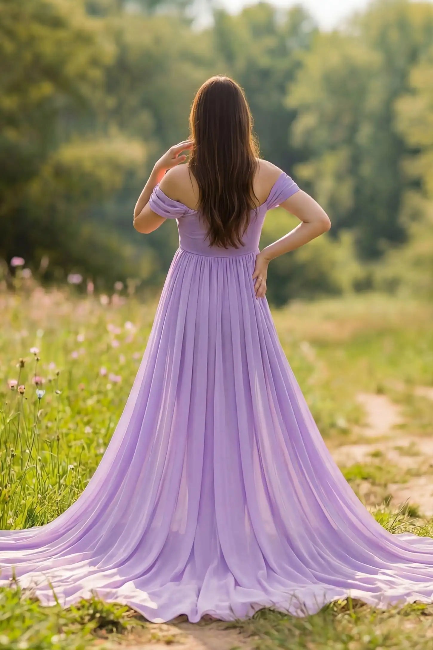 Chiffon-Finish Flowing Off-The-Shoulder Maternity Photoshoot Gown Back view of Purple Chiffon-Finish Flowing Off-The-Shoulder Maternity Photoshoot Gown featuring a long train on a pregnant model.