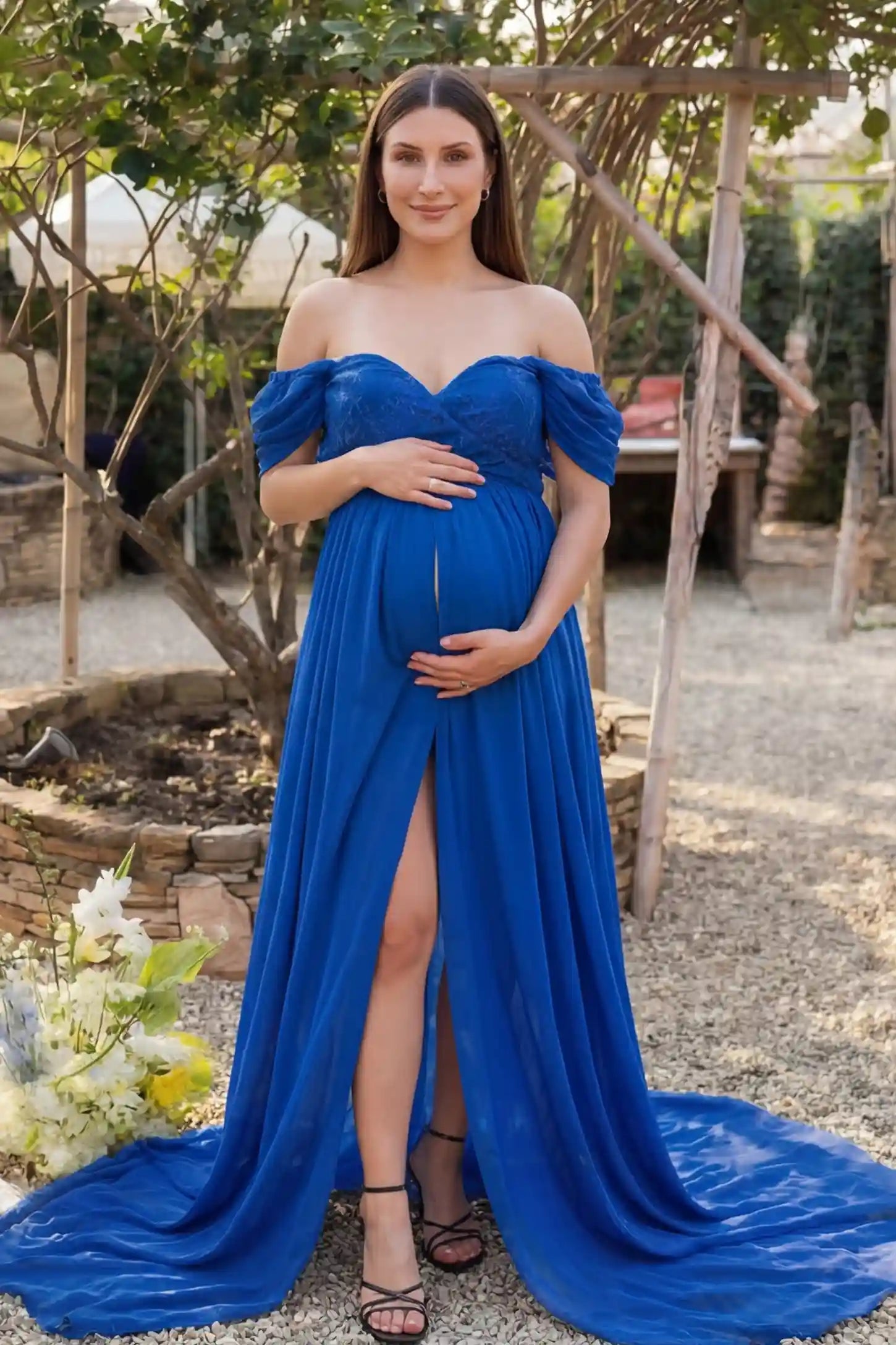 Chiffon Split-Front Maxi Maternity Photoshoot Gown Chiffon Split-Front Maxi Maternity Photoshoot Dress in Blue featuring a delicate lace bodice on a front-facing pregnant model.